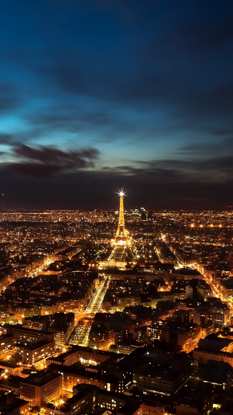 City Skyline Under Blue Sky During Night Time. Wallpaper in 750x1334 Resolution