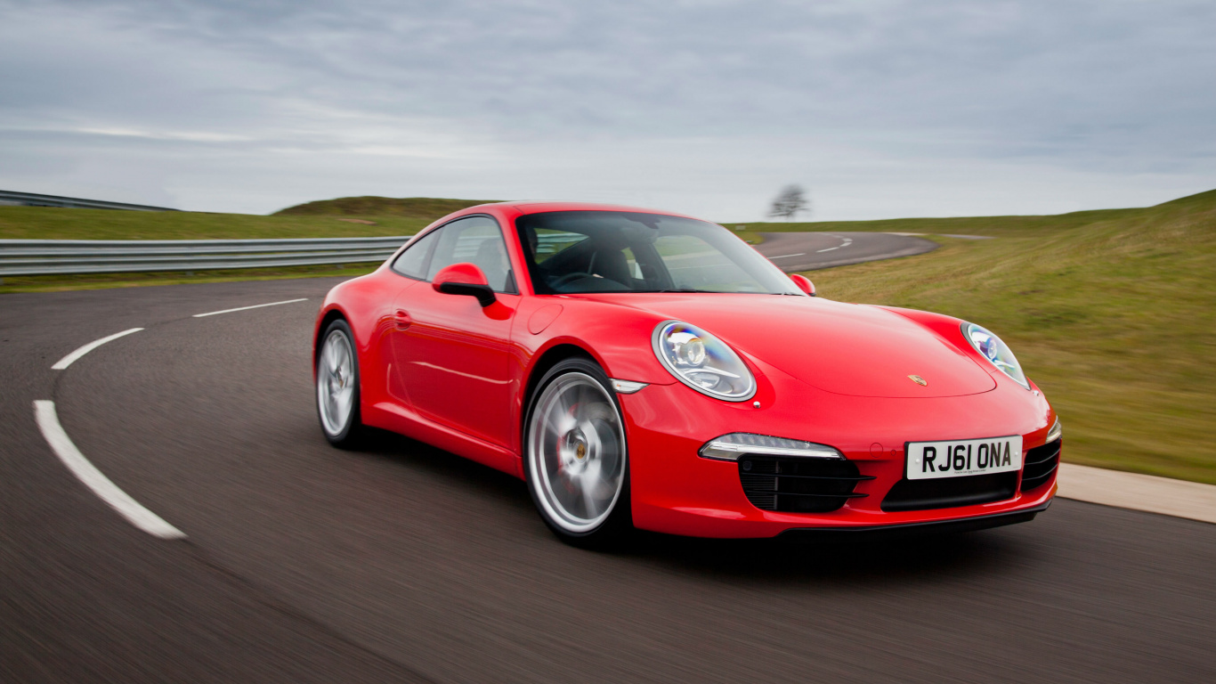 Roter Porsche 911 Tagsüber Unterwegs. Wallpaper in 1366x768 Resolution