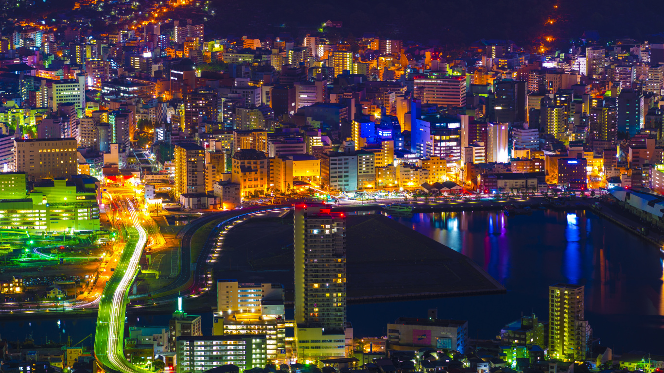 City With High Rise Buildings During Night Time. Wallpaper in 1366x768 Resolution