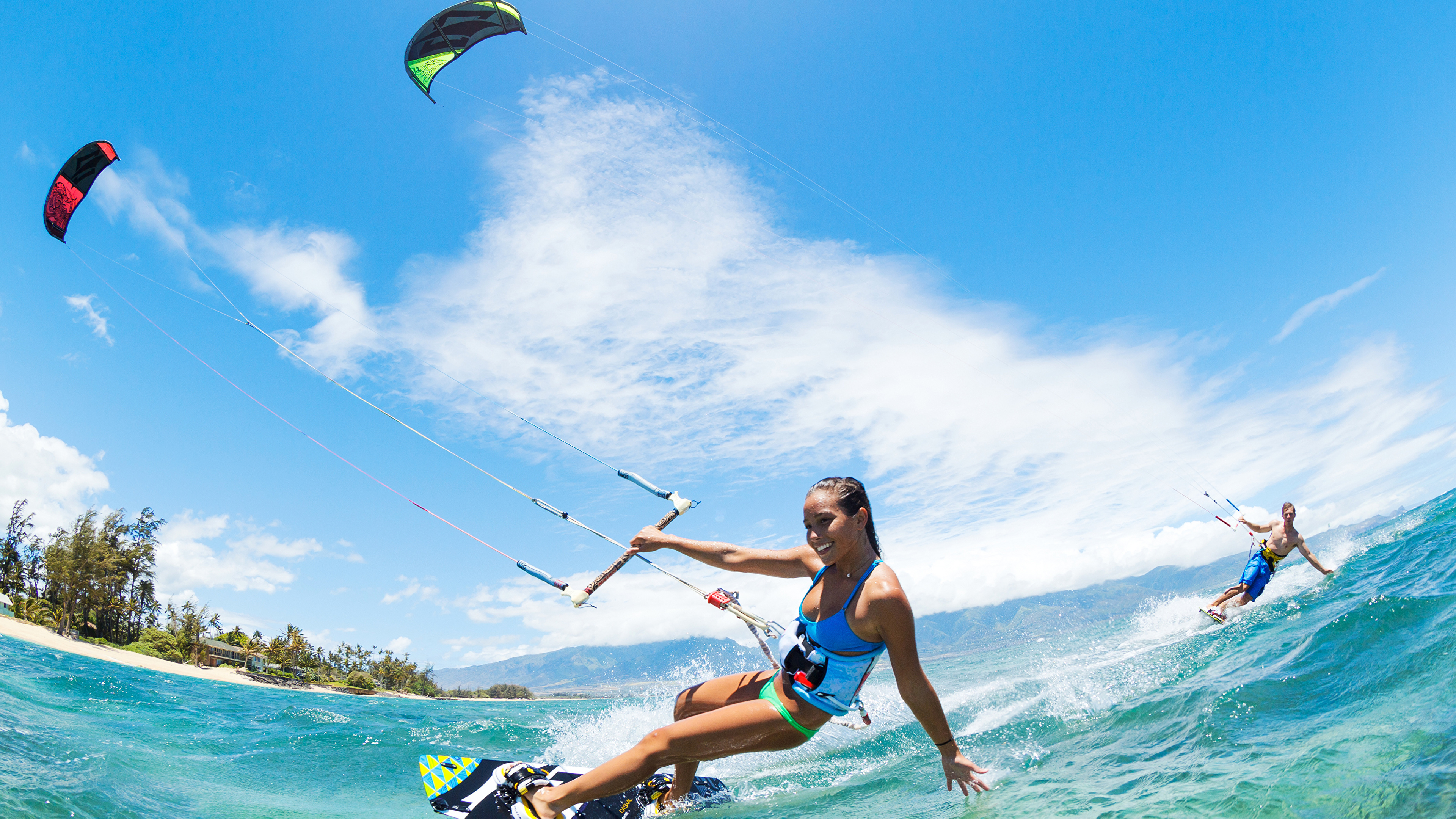 Woman in Blue and Black Bikini Top and Blue Shorts Surfing on Sea Waves During Daytime. Wallpaper in 3840x2160 Resolution