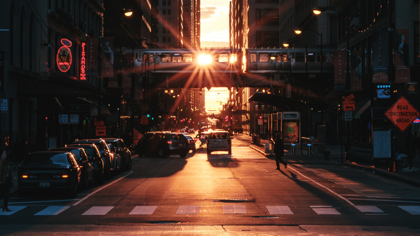 Cars on Road Between High Rise Buildings During Night Time. Wallpaper in 1366x768 Resolution