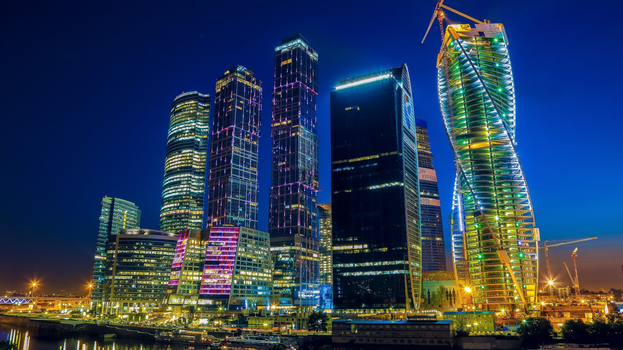 City Buildings With Lights During Night Time. Wallpaper in 1280x720 Resolution
