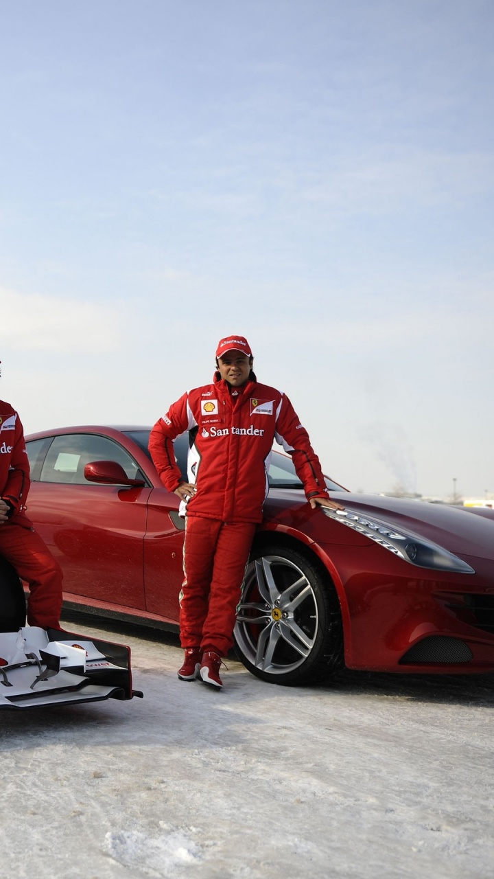 3 Men in Red Shirts Sitting on Red Convertible Car. Wallpaper in 720x1280 Resolution