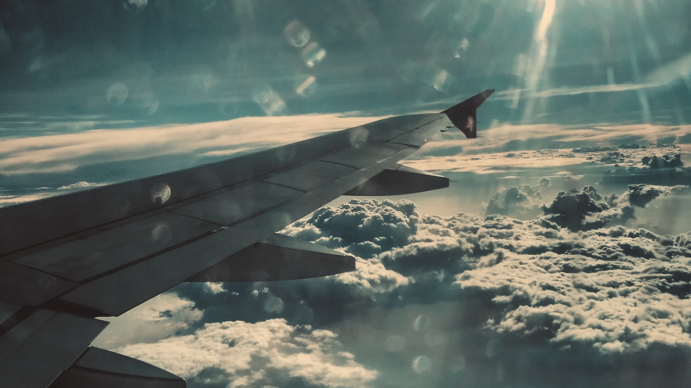 Airplane Wing Over White Clouds During Daytime. Wallpaper in 1366x768 Resolution