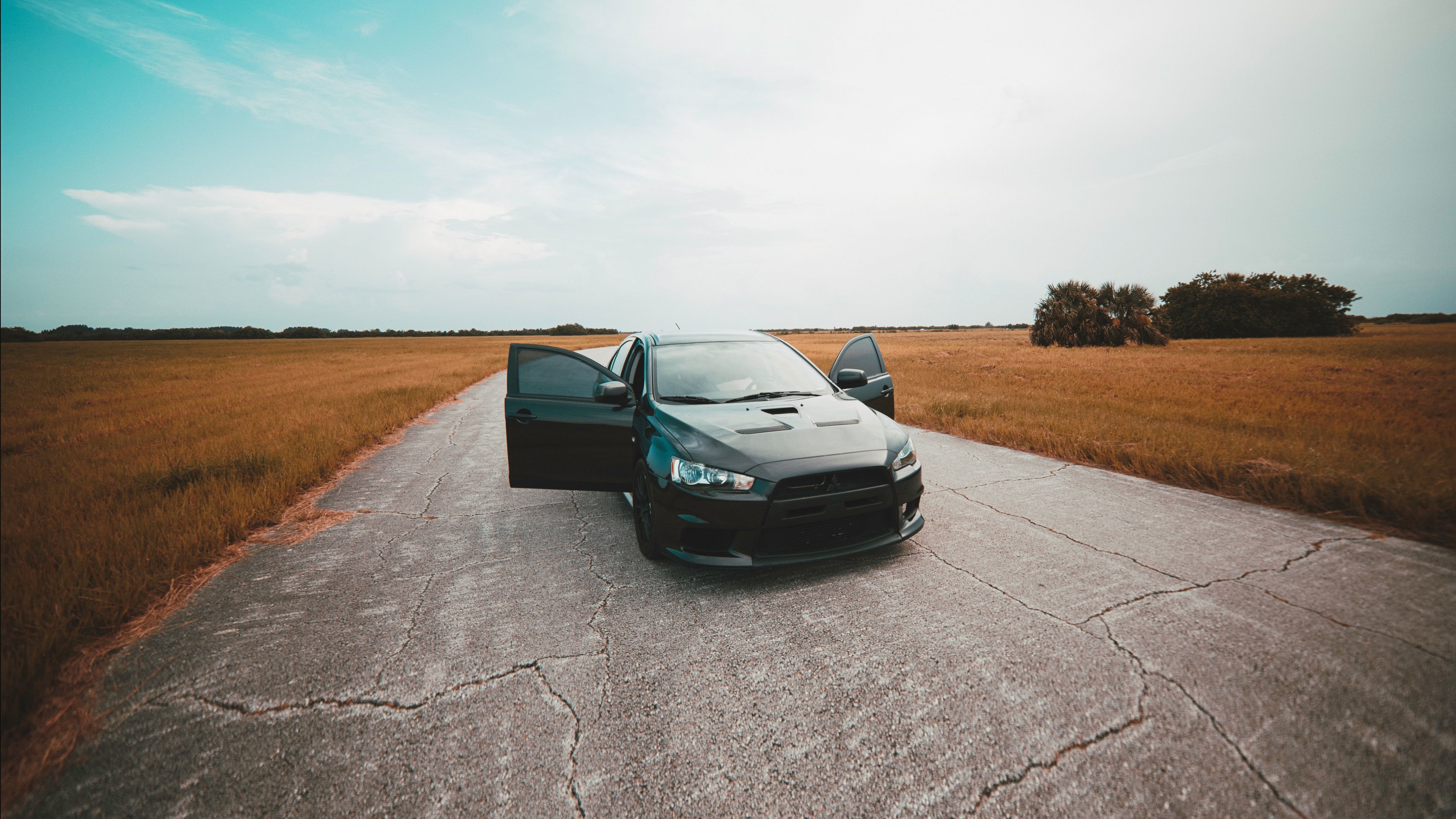 Black Chevrolet Camaro on Road During Daytime. Wallpaper in 3840x2160 Resolution