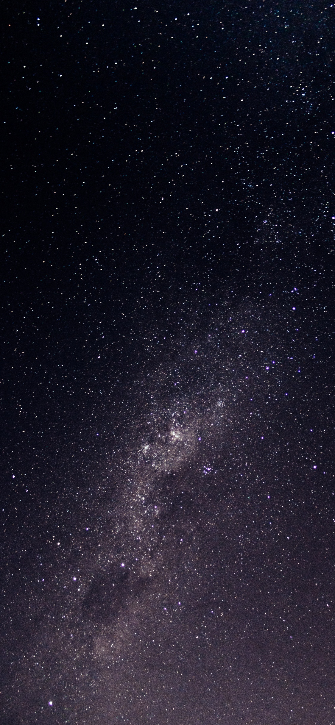 Starry Night Sky Over Starry Night. Wallpaper in 1125x2436 Resolution