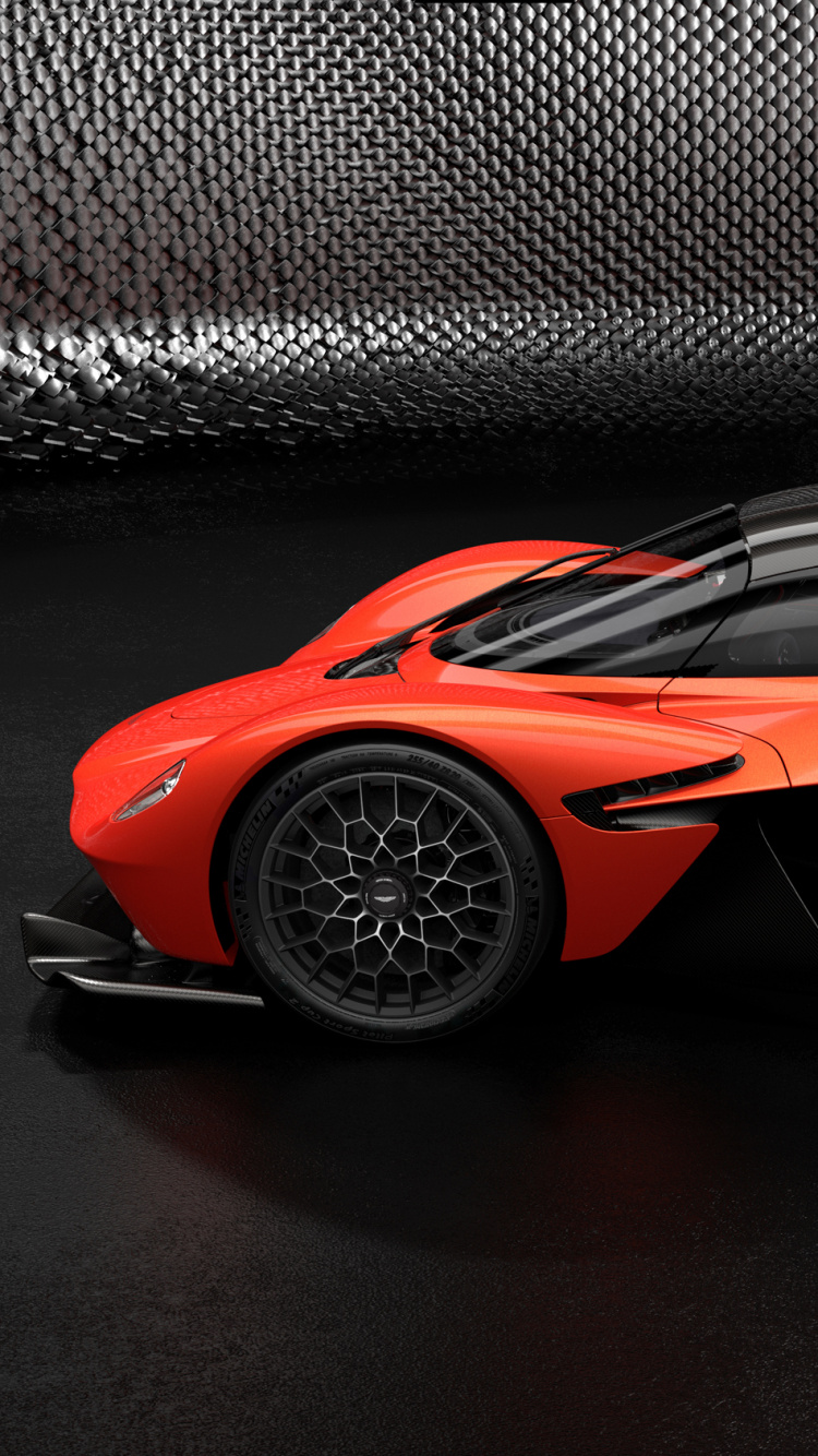 Red Ferrari 458 Italia on Black Background. Wallpaper in 750x1334 Resolution