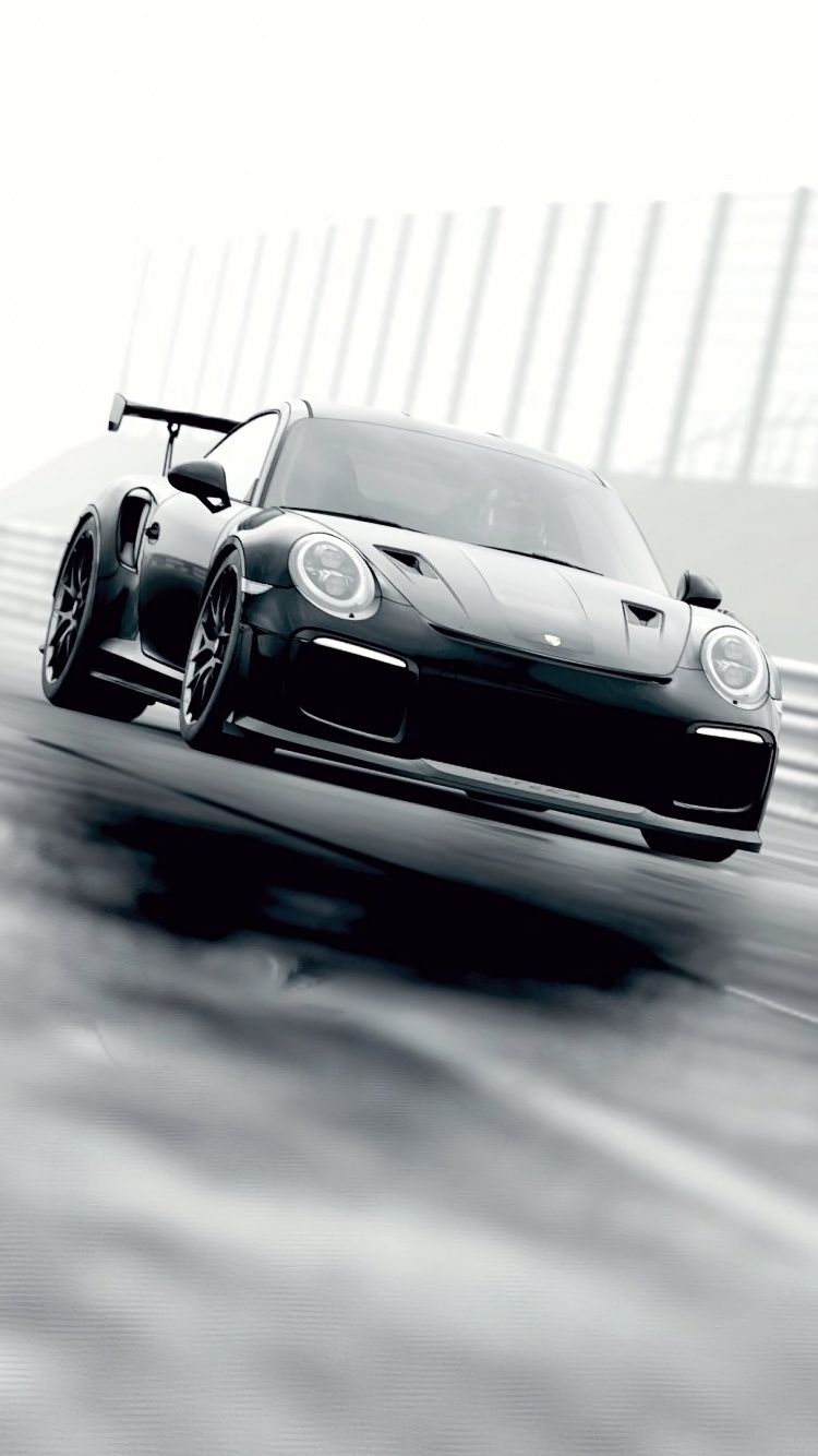 Weiß-schwarzer Porsche 911 Unterwegs. Wallpaper in 750x1334 Resolution