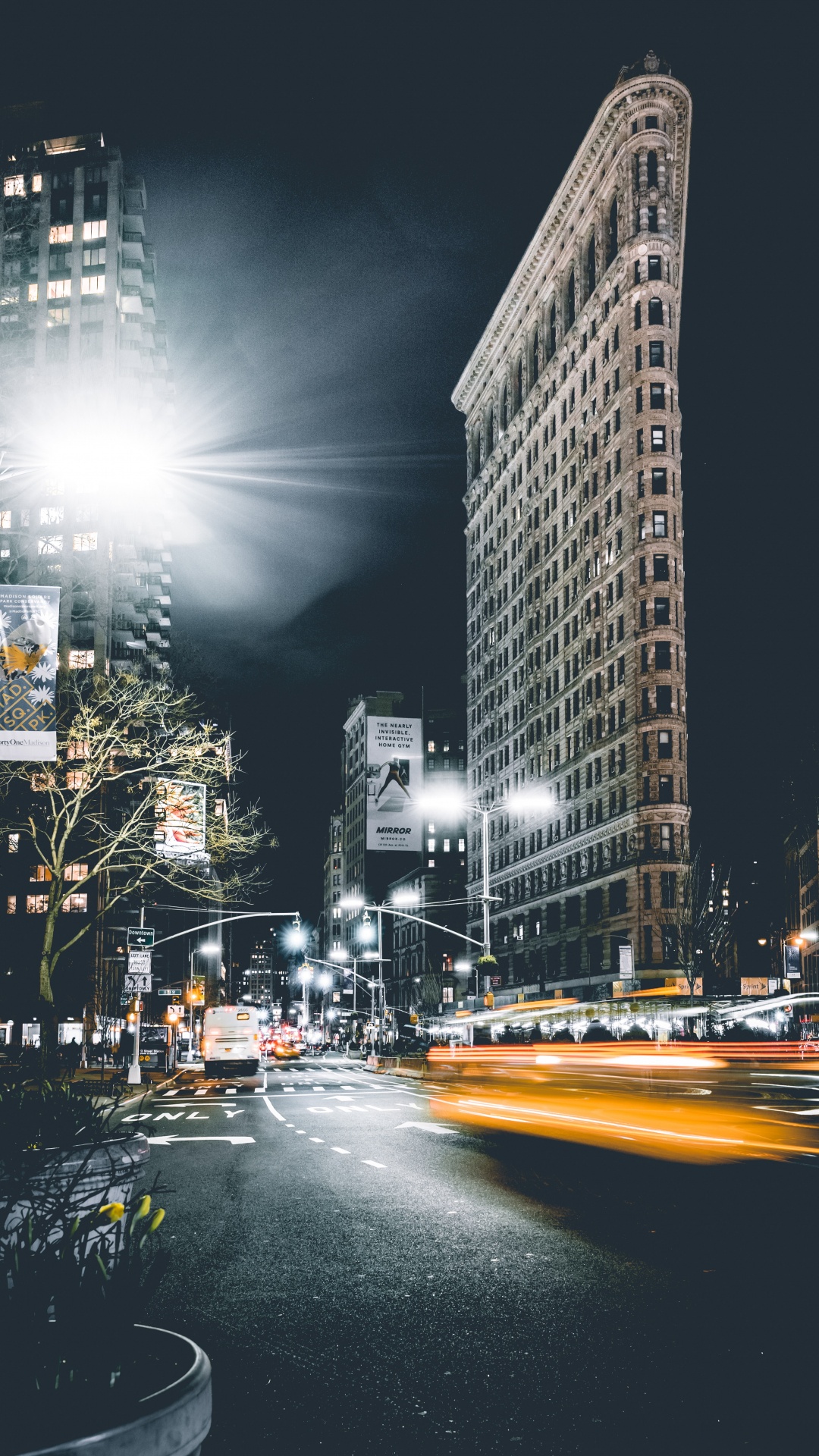 Cars on Road Near High Rise Buildings During Night Time. Wallpaper in 1080x1920 Resolution