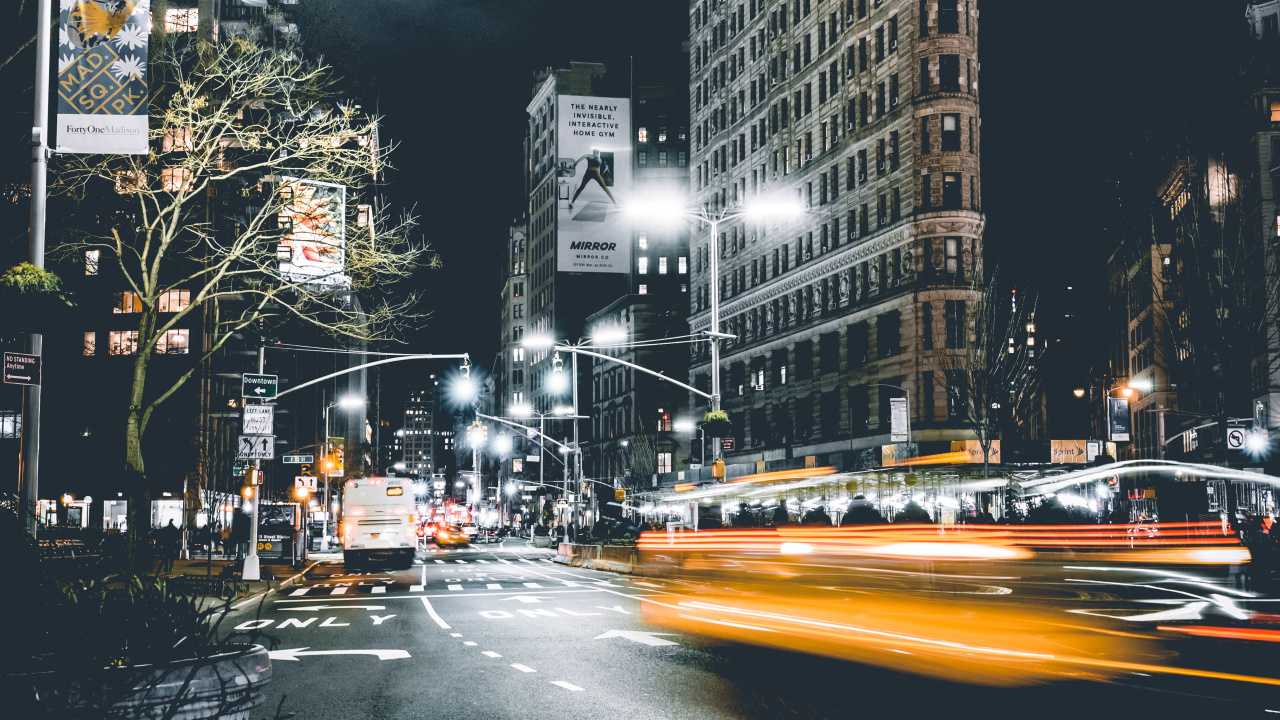 Cars on Road Near High Rise Buildings During Night Time. Wallpaper in 1280x720 Resolution