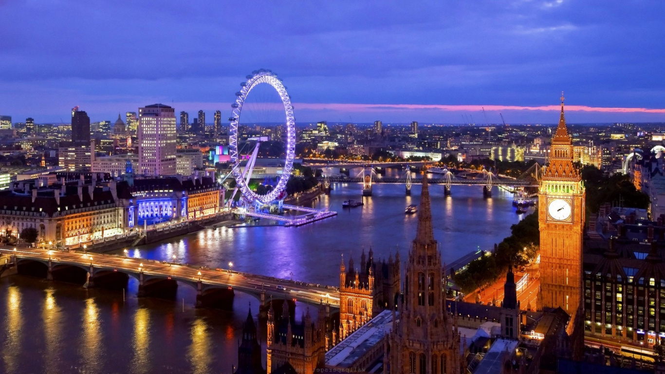 Ferris Wheel Near City Buildings During Night Time. Wallpaper in 1366x768 Resolution