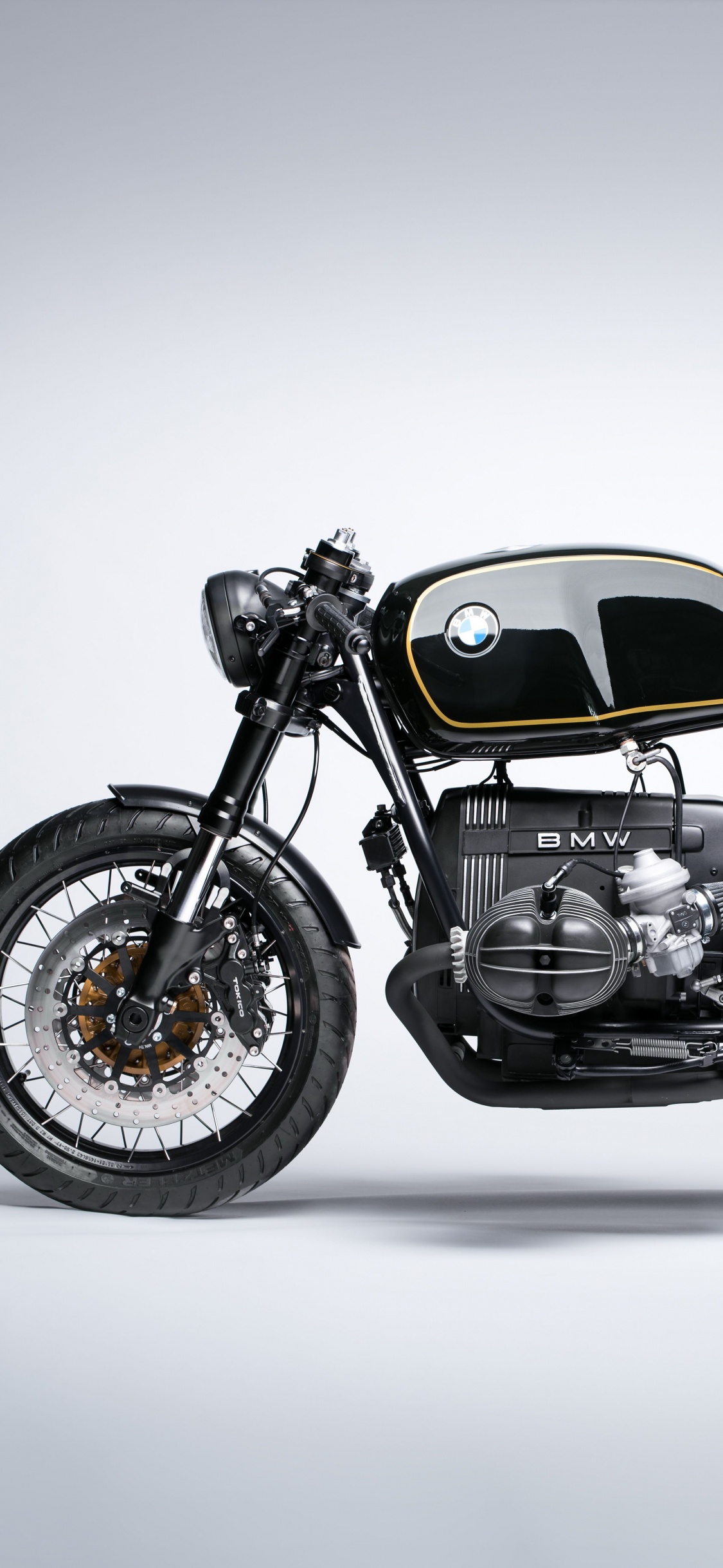 Black and Silver Cruiser Motorcycle. Wallpaper in 1125x2436 Resolution