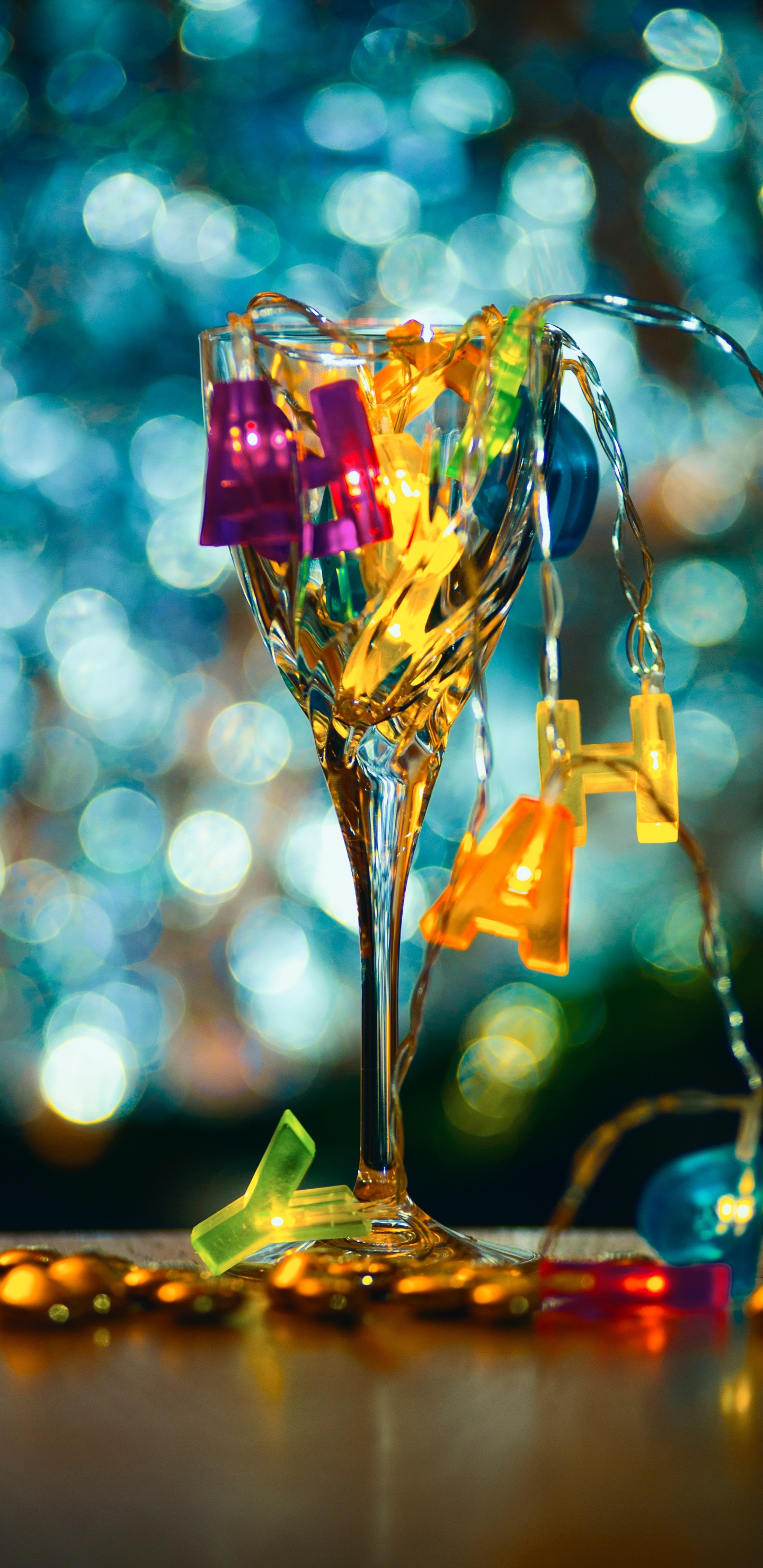 Clear Glass Vase With Yellow and Pink Heart Shaped Candies. Wallpaper in 1440x2960 Resolution