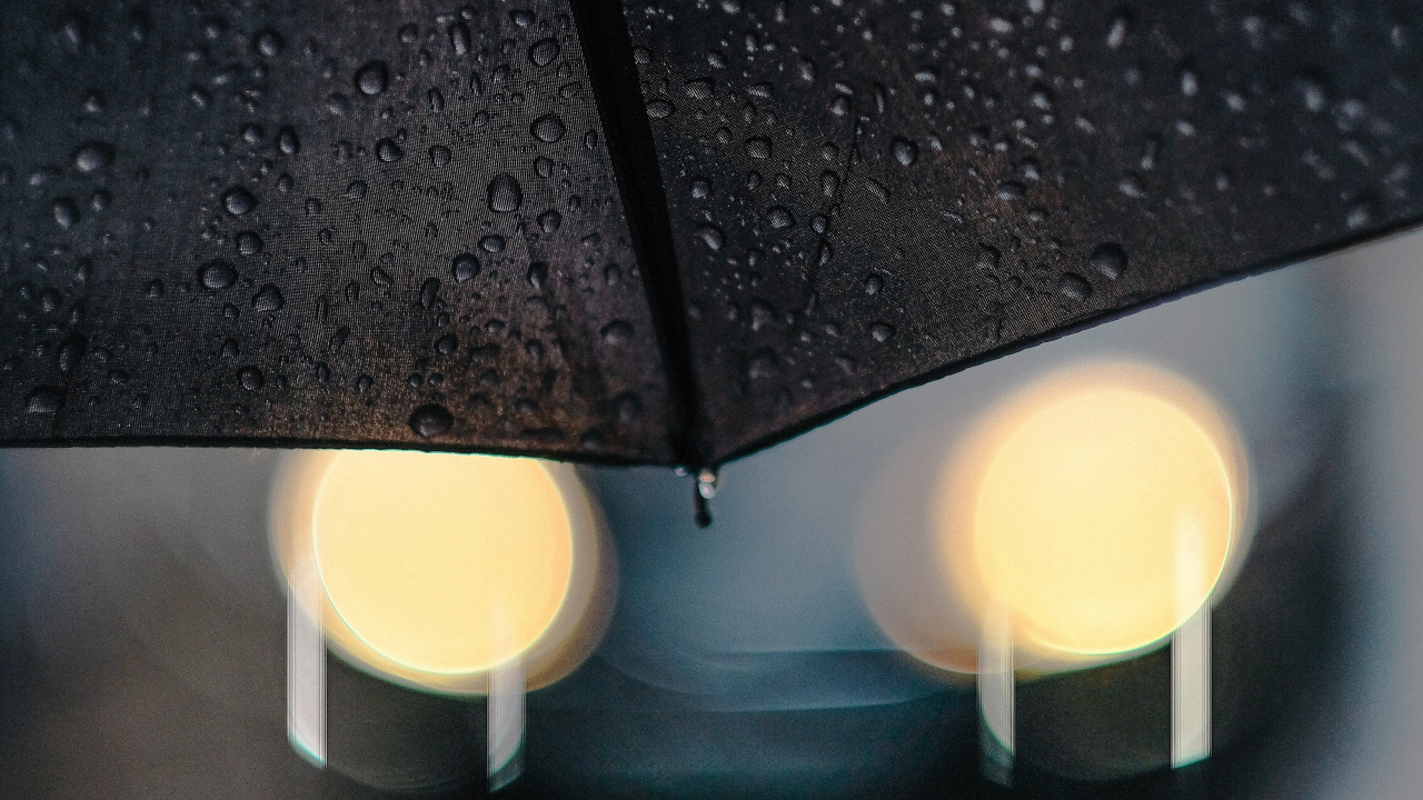 Black Umbrella on White Plastic Bucket. Wallpaper in 1280x720 Resolution