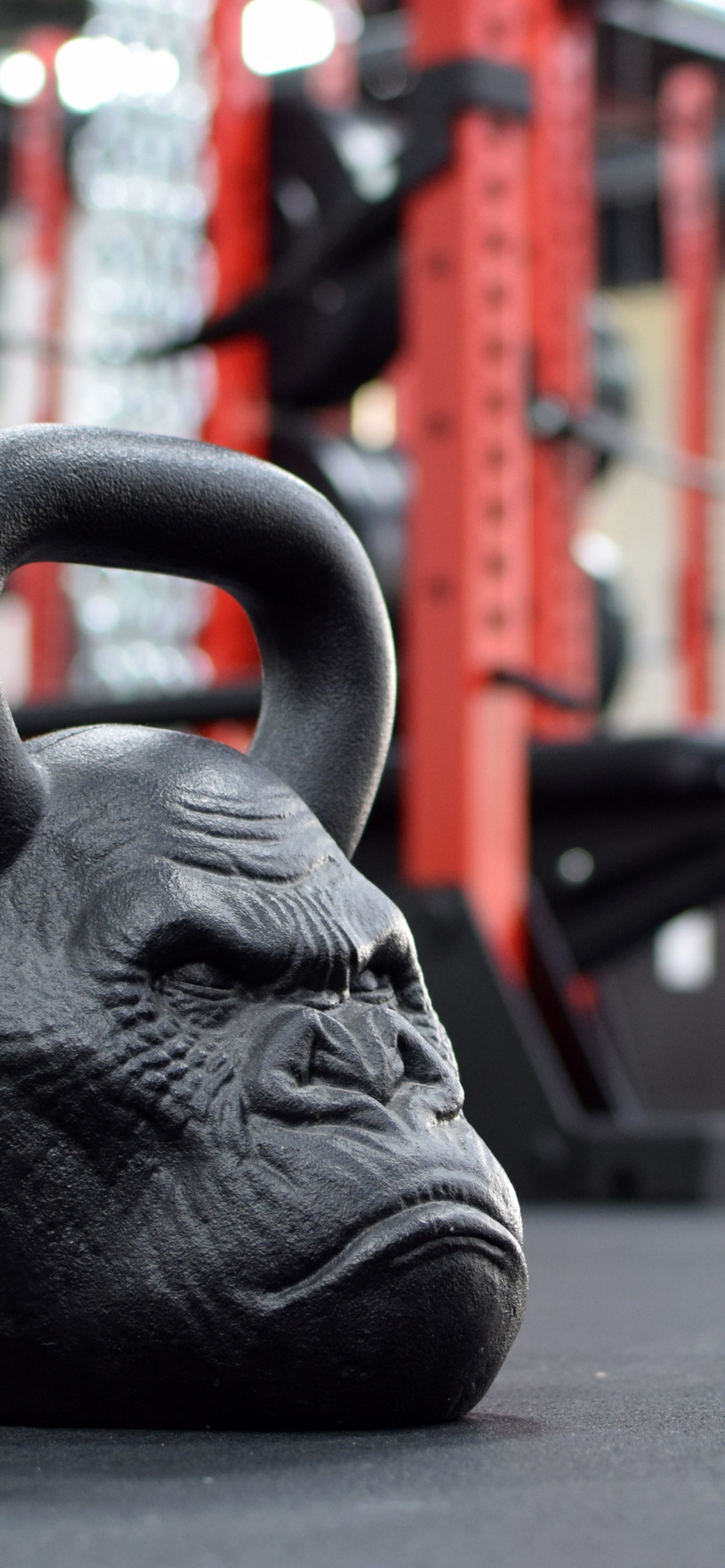 Schwarze Keramikkopfbüste Auf Schwarzer Oberfläche. Wallpaper in 1242x2688 Resolution