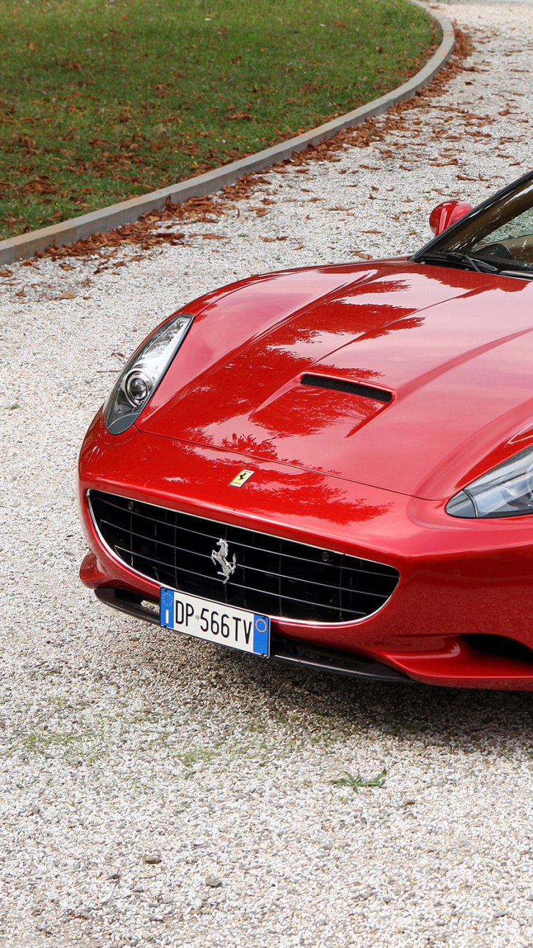 Red Ferrari 458 Italia Parked on Gray Concrete Road During Daytime. Wallpaper in 750x1334 Resolution