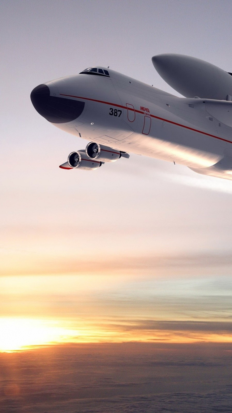 White and Black Airplane in The Sky. Wallpaper in 750x1334 Resolution