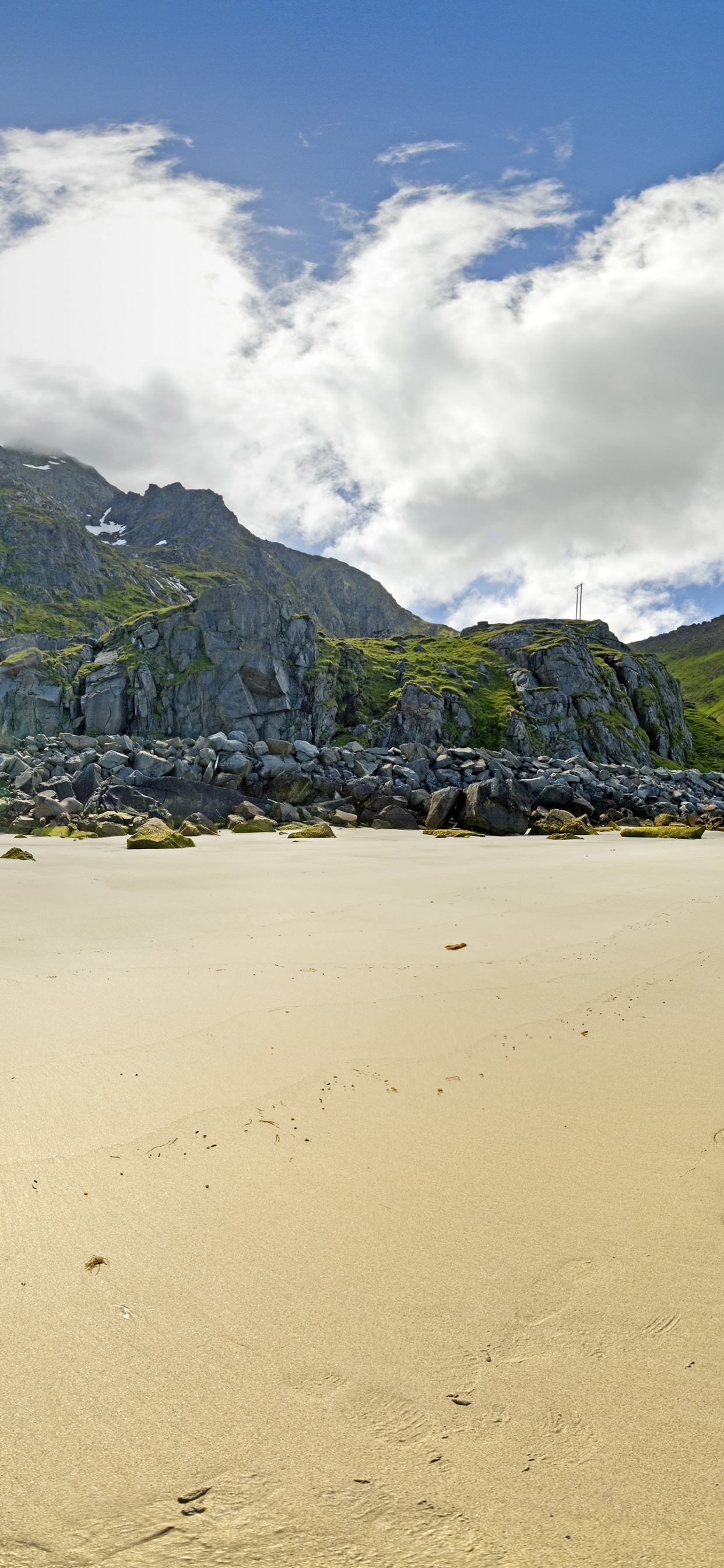 Green Mountain Beside Body of Water During Daytime. Wallpaper in 1242x2688 Resolution