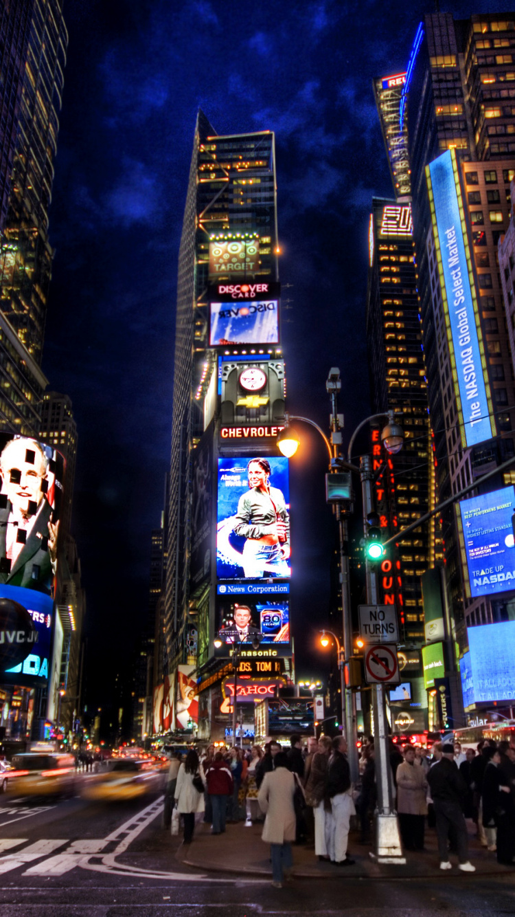 People Walking on Pedestrian Lane in City During Night Time. Wallpaper in 750x1334 Resolution