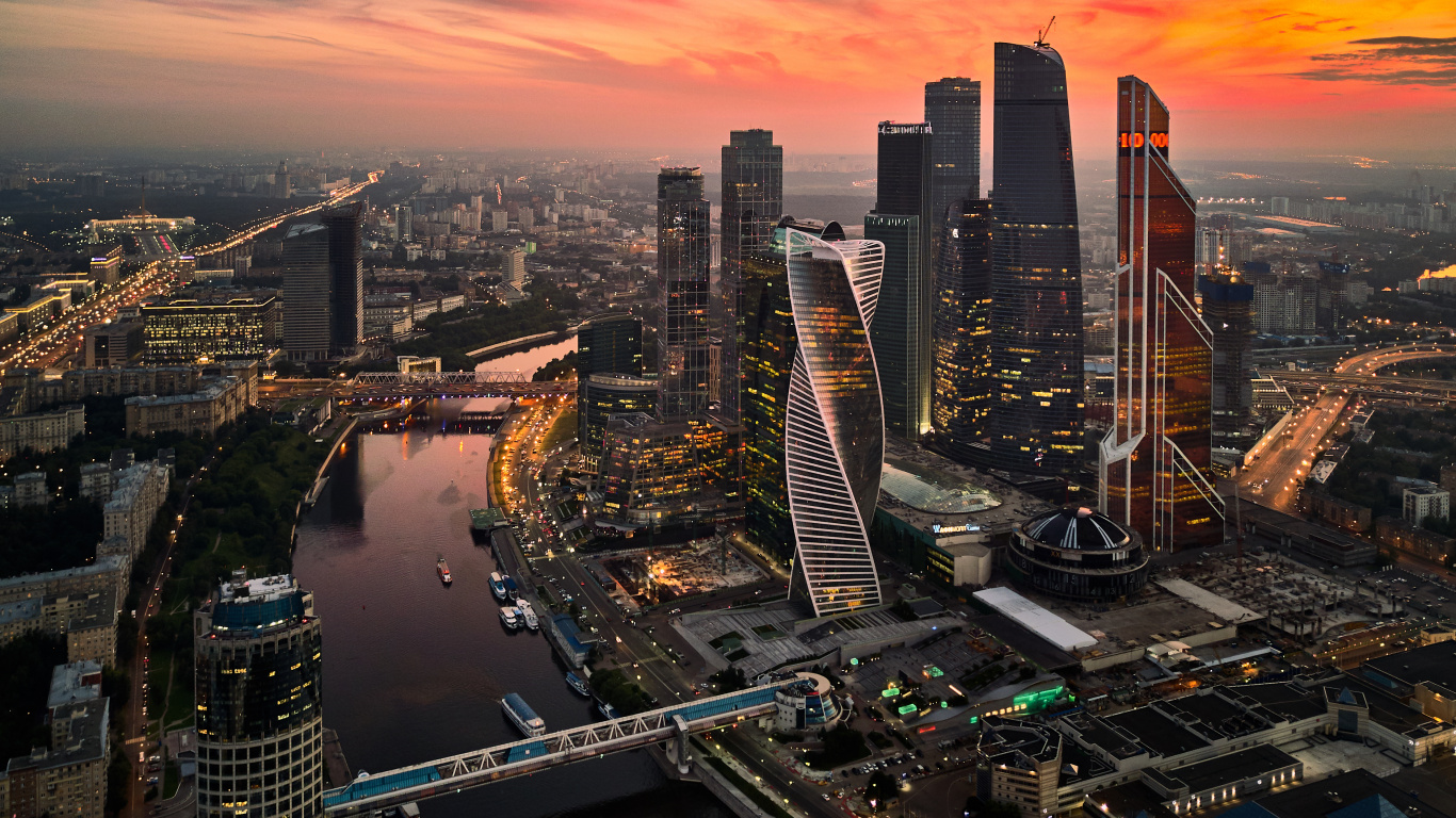 Aerial View of City Buildings During Night Time. Wallpaper in 1366x768 Resolution