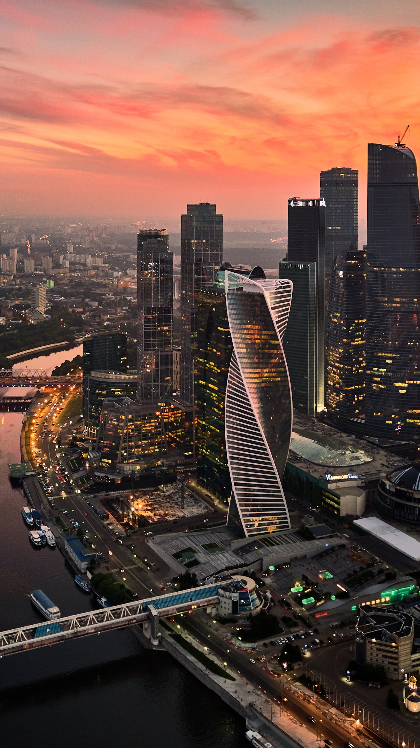 Aerial View of City Buildings During Night Time. Wallpaper in 1440x2560 Resolution