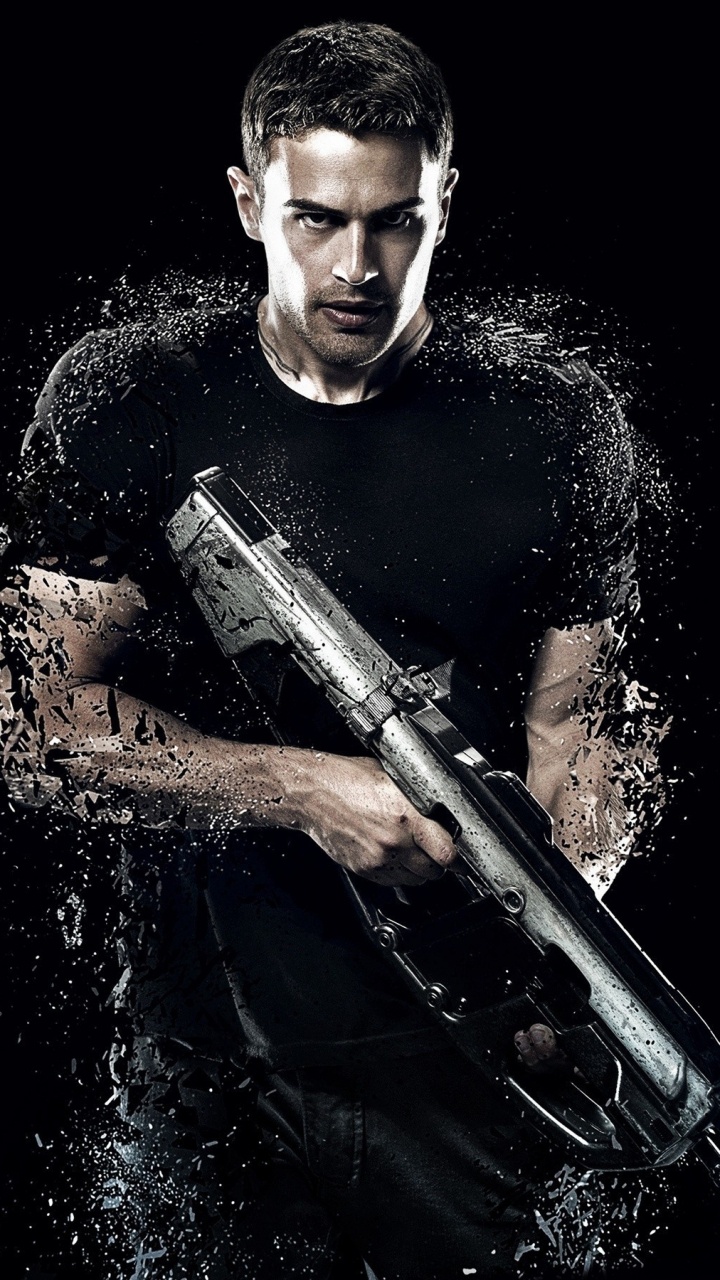 Mann in Schwarzem Rundhalshemd Mit Schwarzem Gewehr. Wallpaper in 720x1280 Resolution