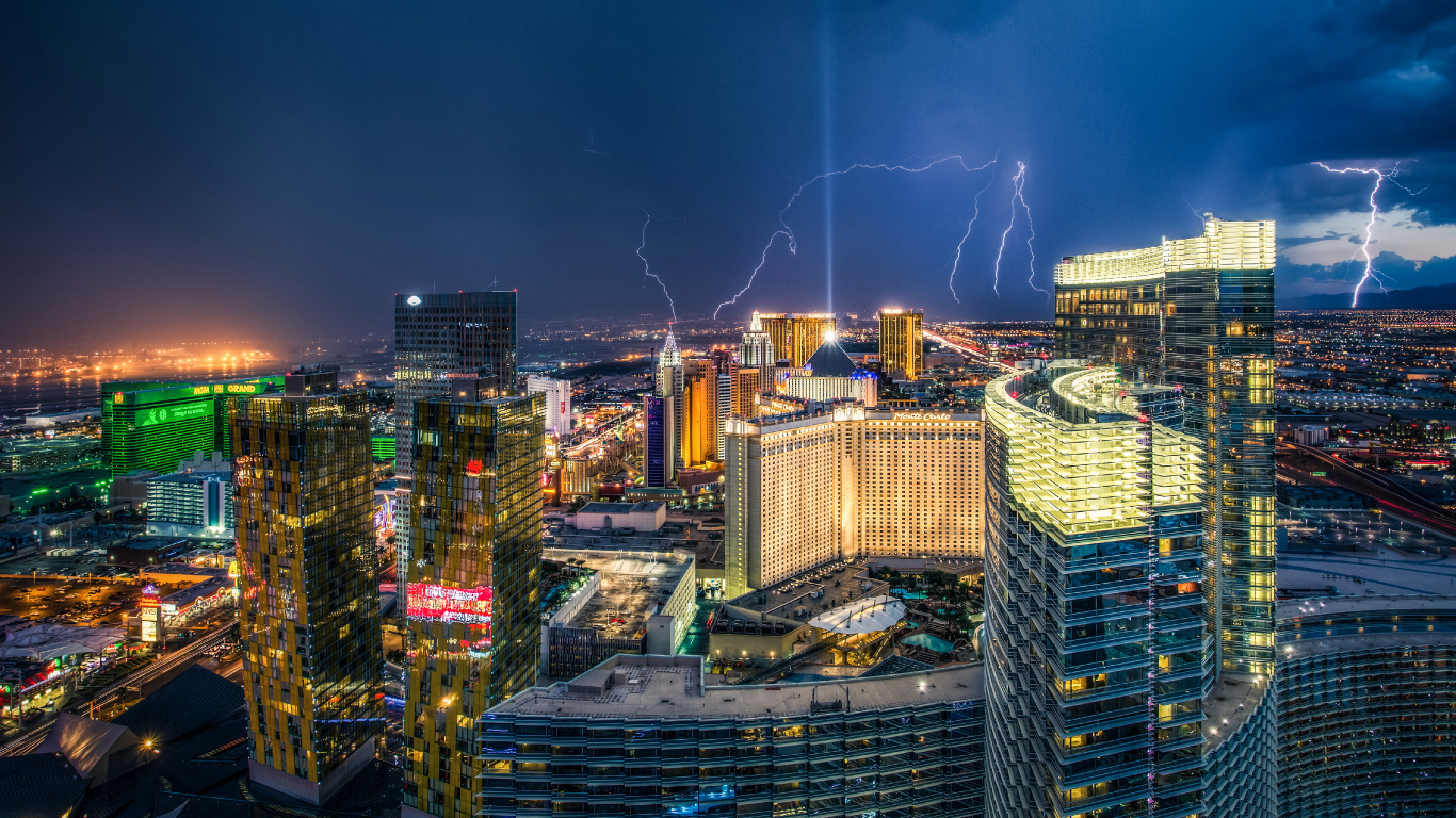 City With High Rise Buildings During Night Time. Wallpaper in 1366x768 Resolution