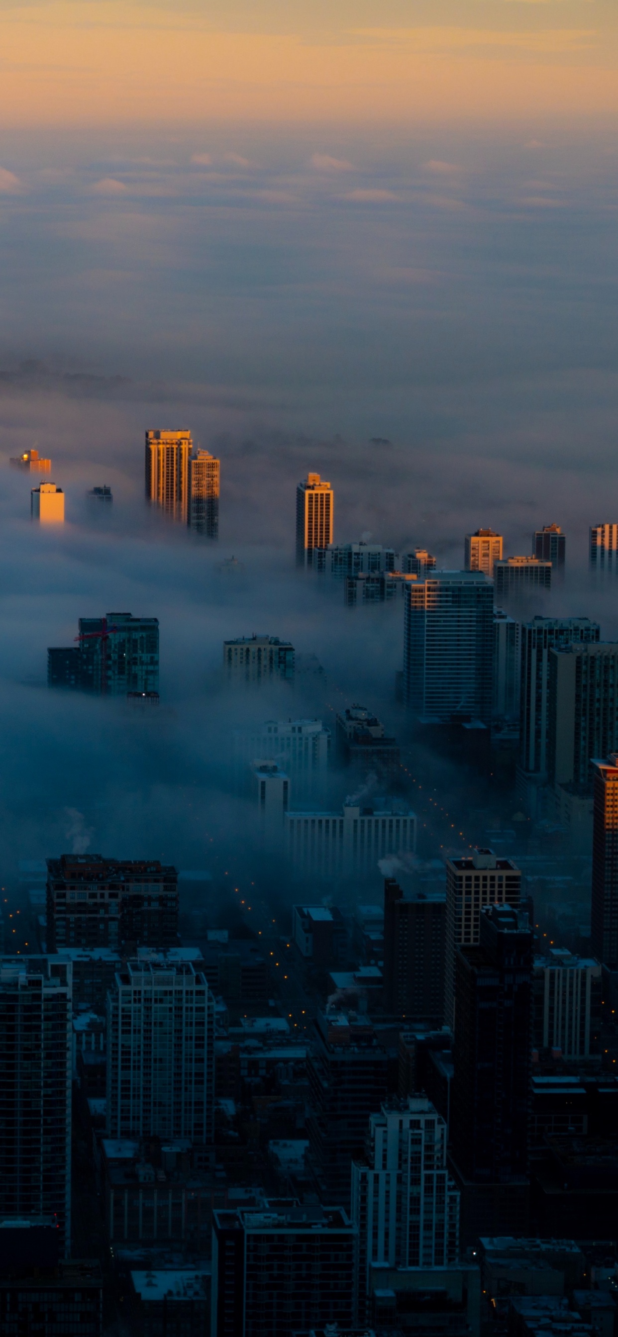 Vista Aérea de Los Edificios de la Ciudad Durante el Día.. Wallpaper in 1242x2688 Resolution