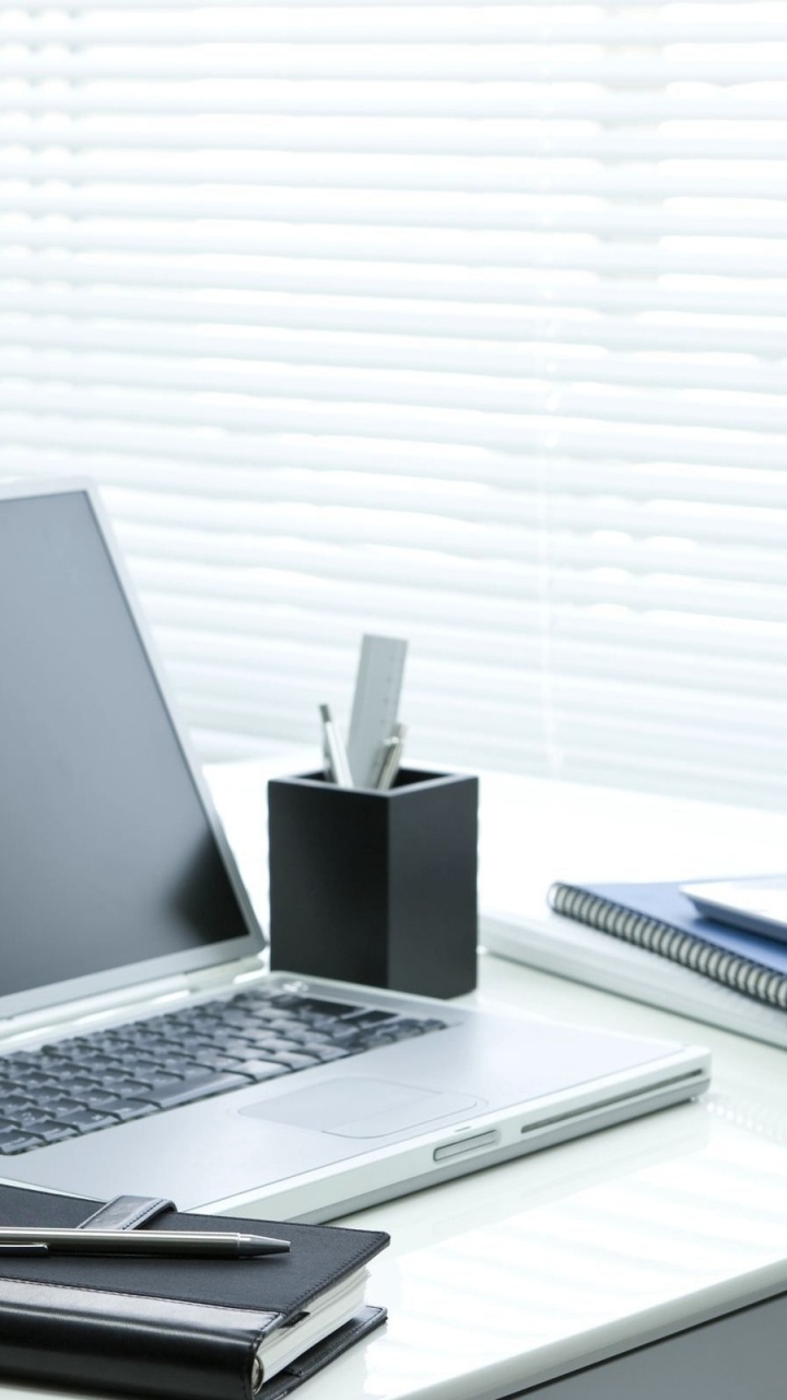 Silver and Black Laptop Computer on White Table. Wallpaper in 720x1280 Resolution