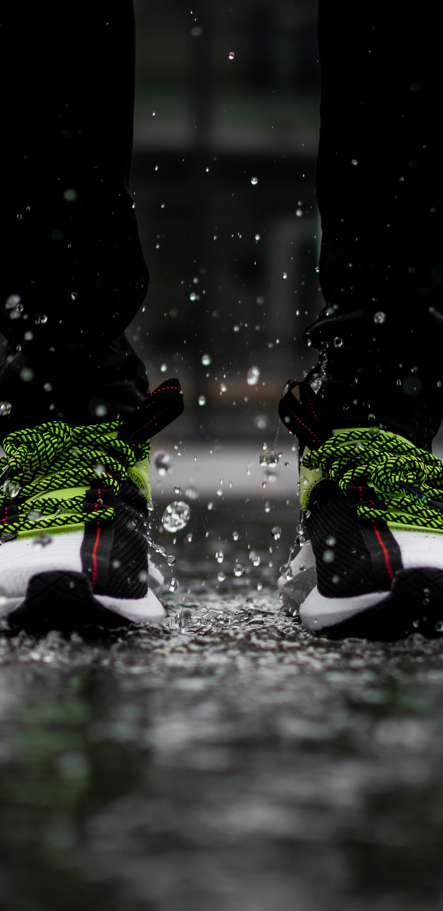 Person in Black Pants Wearing White Red and Black Nike Sneakers. Wallpaper in 1440x2960 Resolution