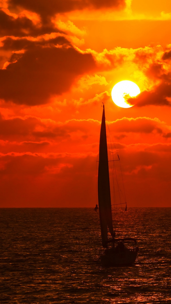 Silhouette of Sailboat on Sea During Sunset. Wallpaper in 720x1280 Resolution