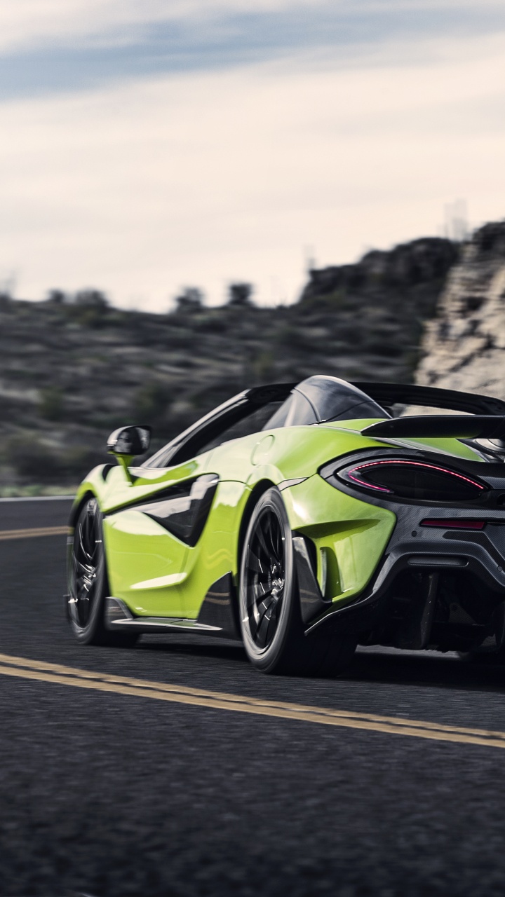 Green and Black Porsche 911 on Road During Daytime. Wallpaper in 720x1280 Resolution