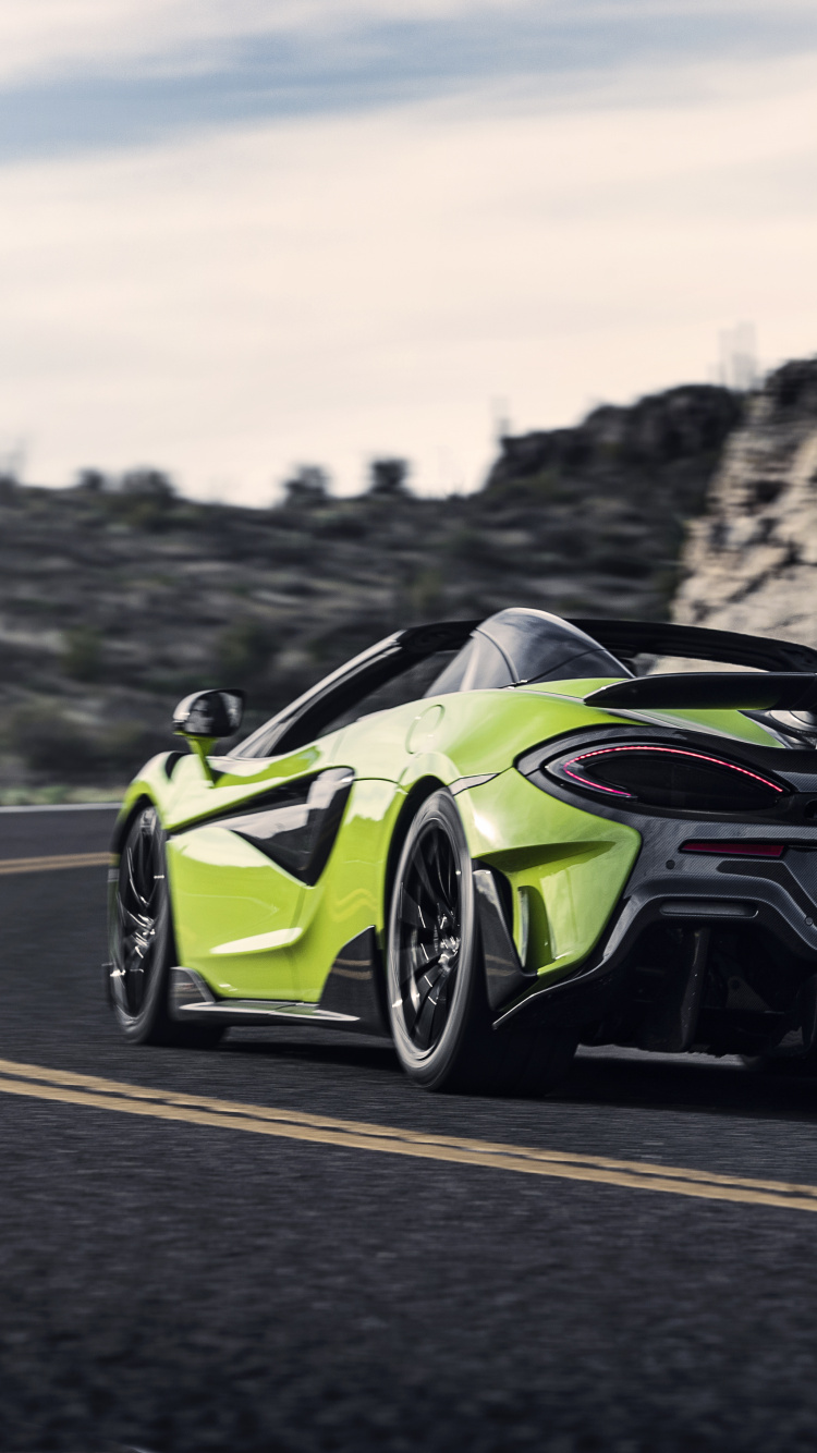 Green and Black Porsche 911 on Road During Daytime. Wallpaper in 750x1334 Resolution