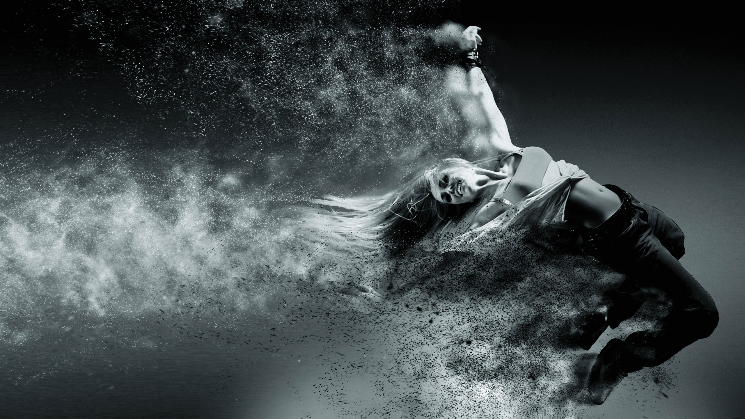 Man in Black Jacket and Pants Lying on Water. Wallpaper in 2560x1440 Resolution