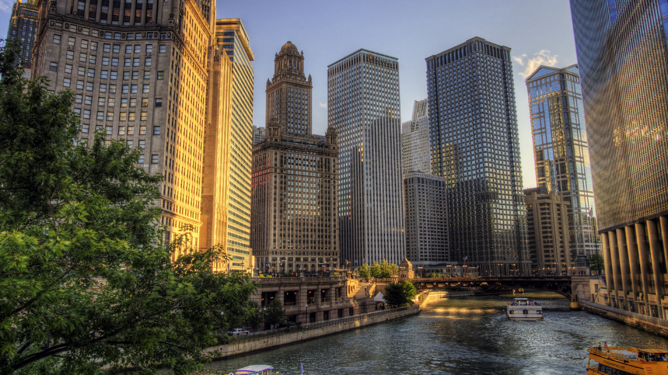 City Buildings Near Body of Water During Night Time. Wallpaper in 1366x768 Resolution
