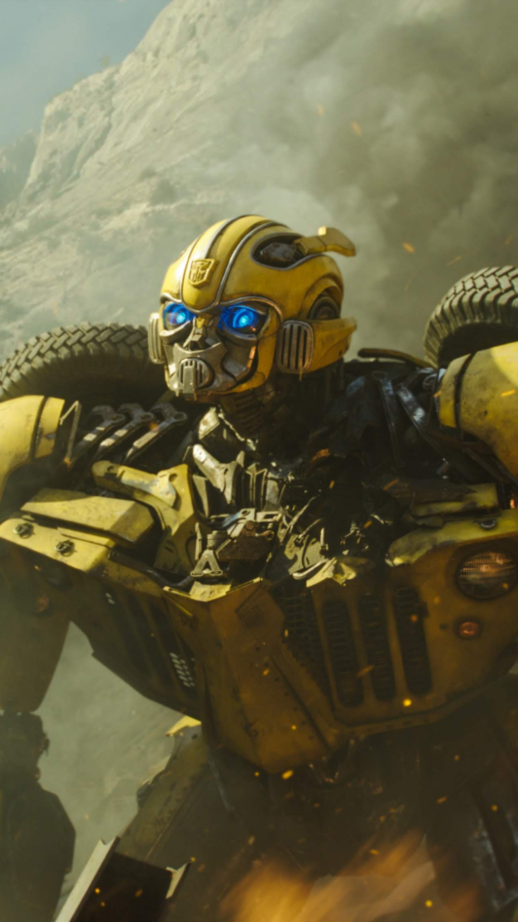 Black and Yellow Robot on Snow Covered Ground. Wallpaper in 750x1334 Resolution