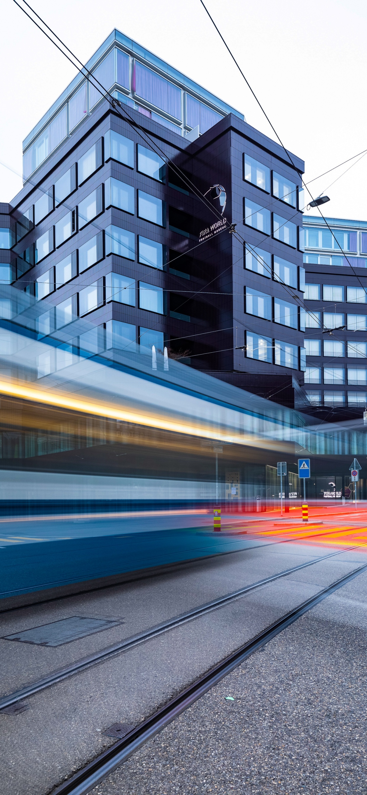 Fifa World Football Museum, Building, Window, Street Light, Tower Block. Wallpaper in 1242x2688 Resolution
