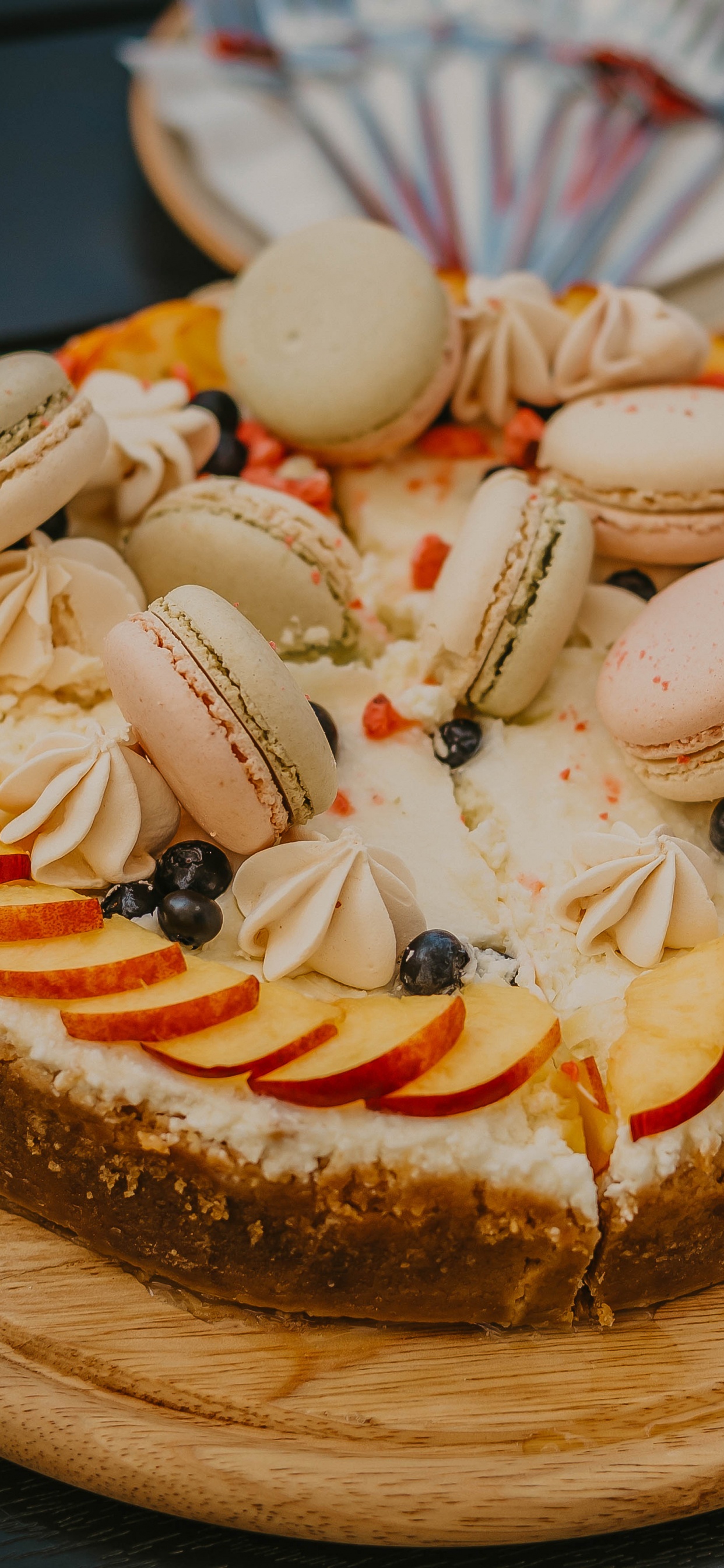 Brown and White Cake With White Icing on Top. Wallpaper in 1242x2688 Resolution
