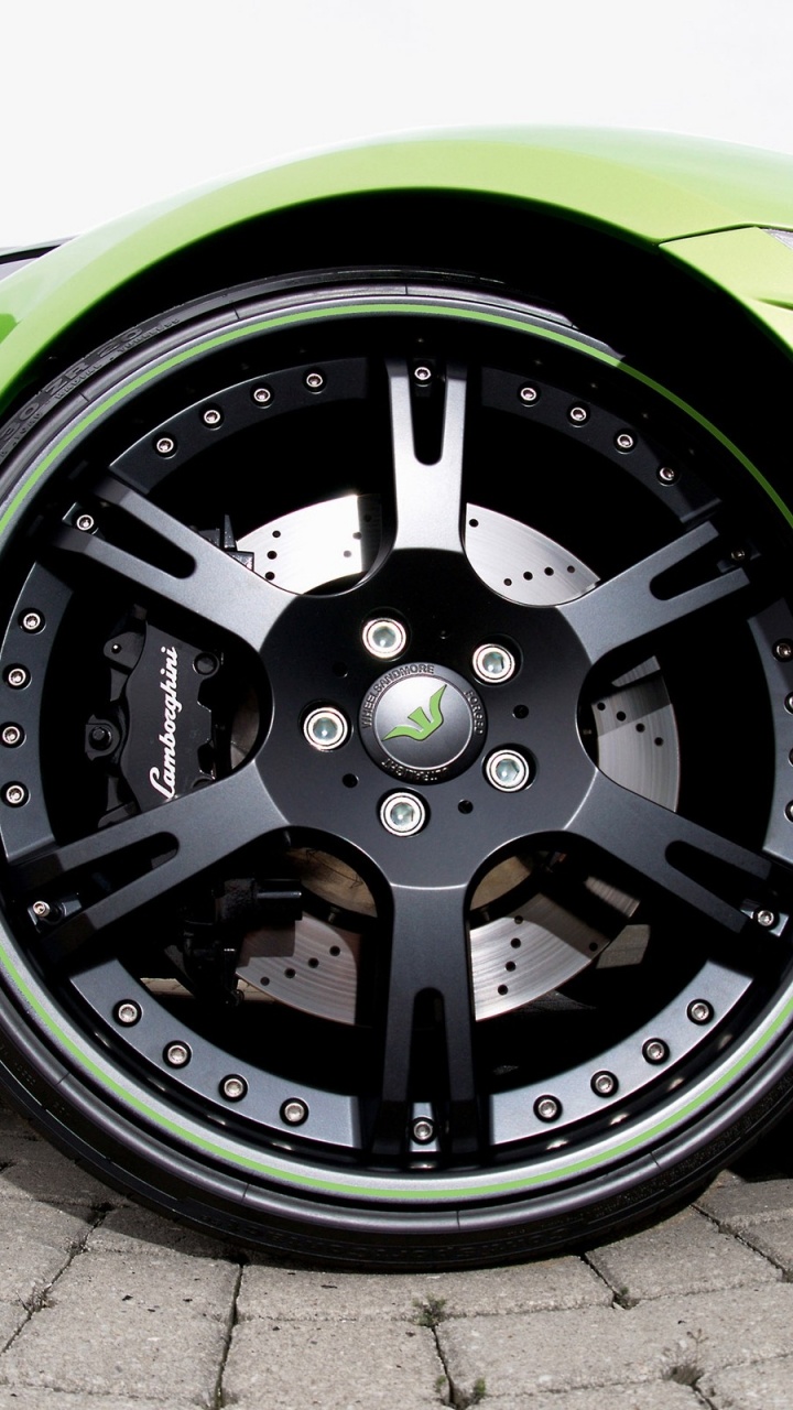 Green and Black Car Wheel. Wallpaper in 720x1280 Resolution