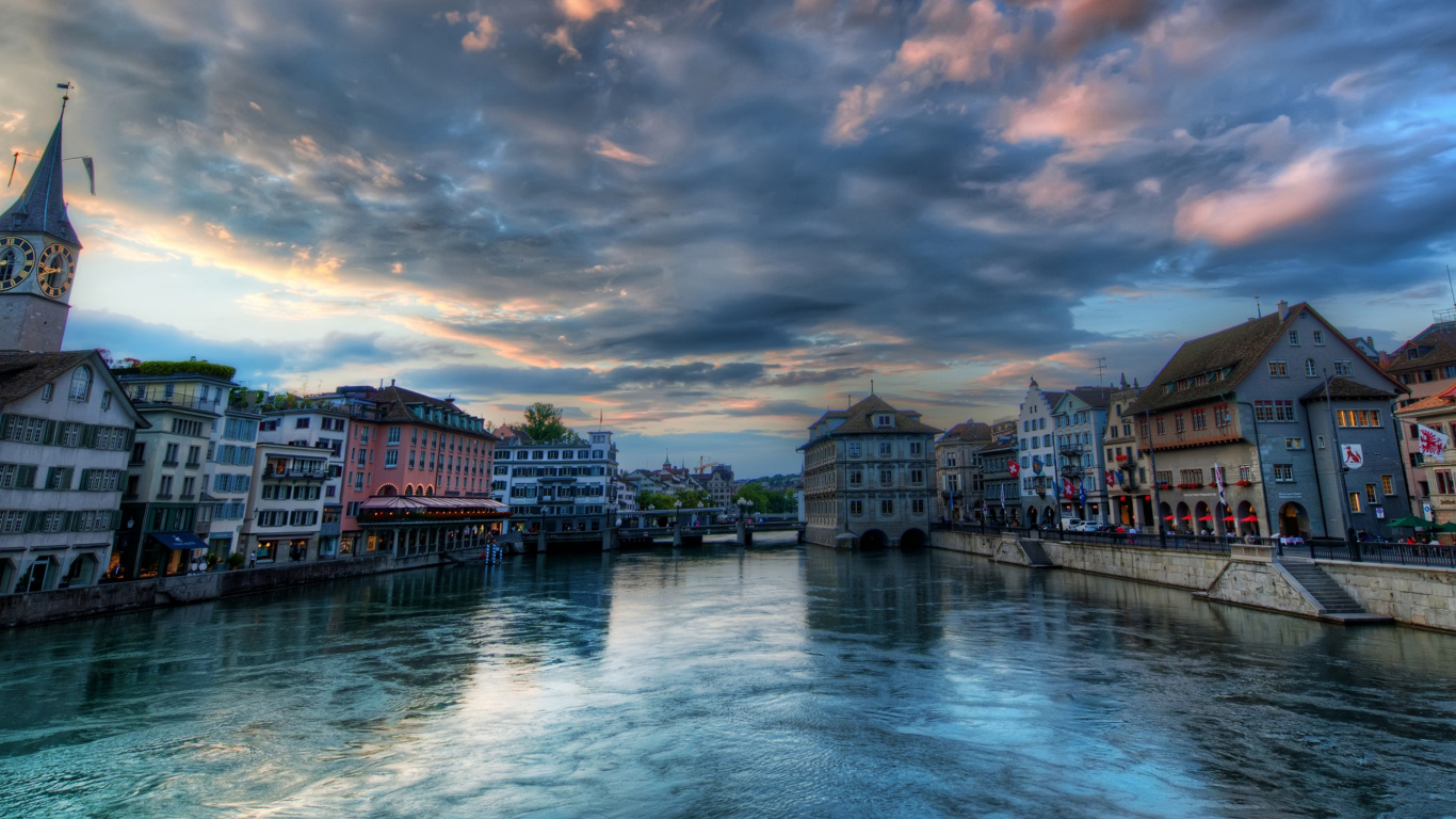 Body of Water Between Buildings Under Cloudy Sky During Daytime. Wallpaper in 1366x768 Resolution