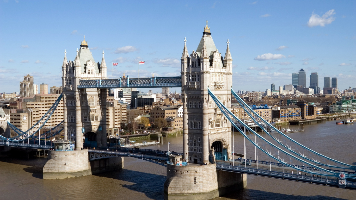 White and Brown Concrete Bridge Under Blue Sky During Daytime. Wallpaper in 1366x768 Resolution