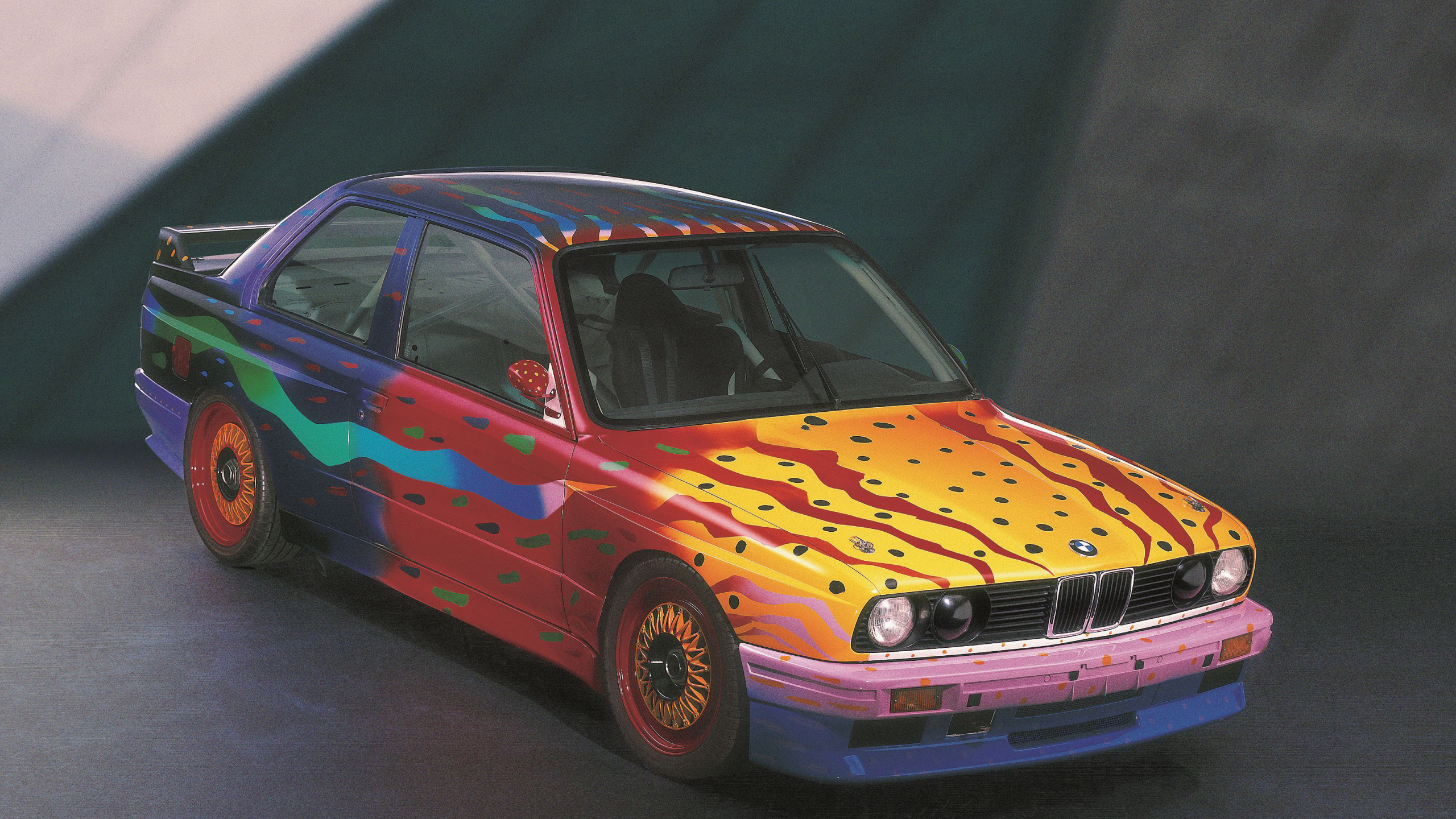 Yellow and Red Car Scale Model. Wallpaper in 2560x1440 Resolution