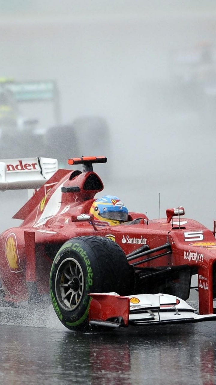 Red and Black f 1 Race Car on Water. Wallpaper in 720x1280 Resolution