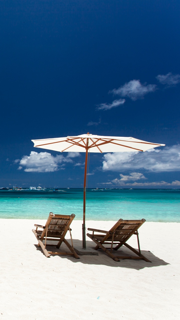 White and Brown Beach Umbrellas on White Sand Beach During Daytime. Wallpaper in 720x1280 Resolution