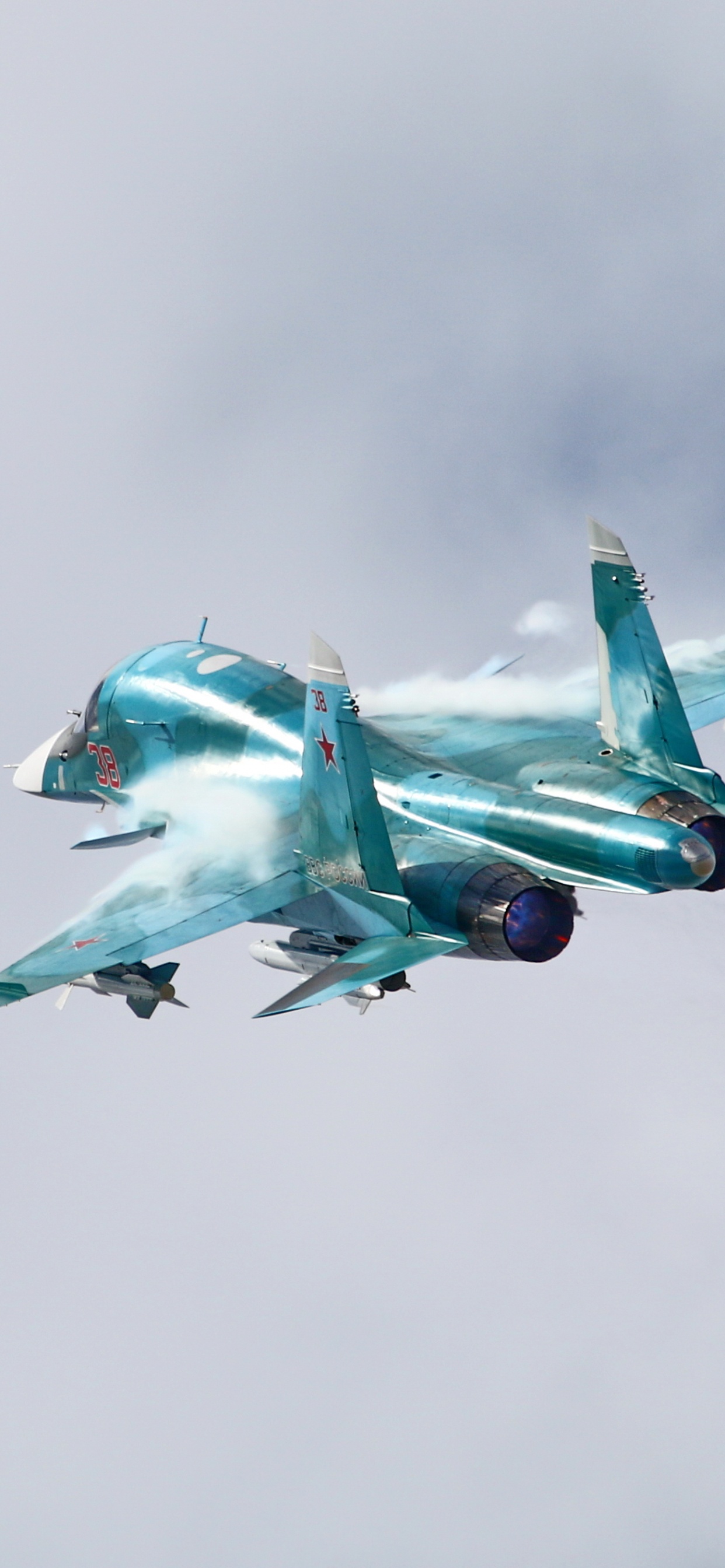 Green and White Fighter Plane Flying in The Sky. Wallpaper in 1242x2688 Resolution