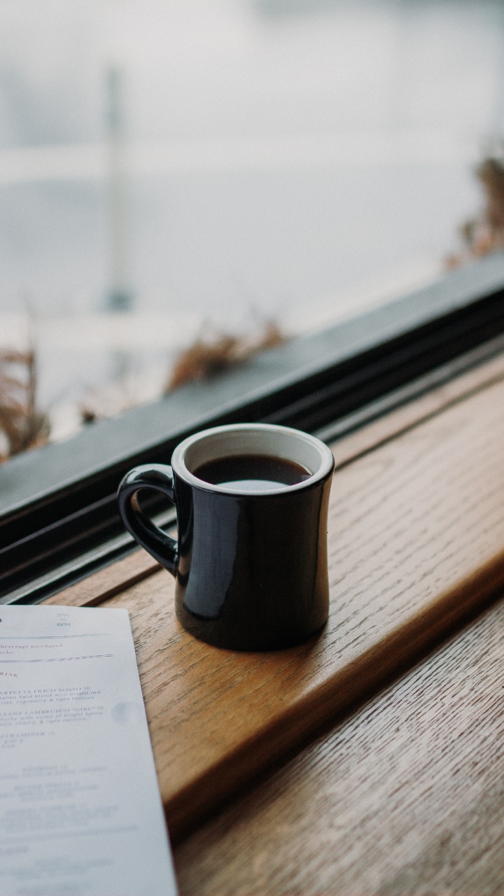 Black Ceramic Mug on Brown Wooden Table. Wallpaper in 720x1280 Resolution