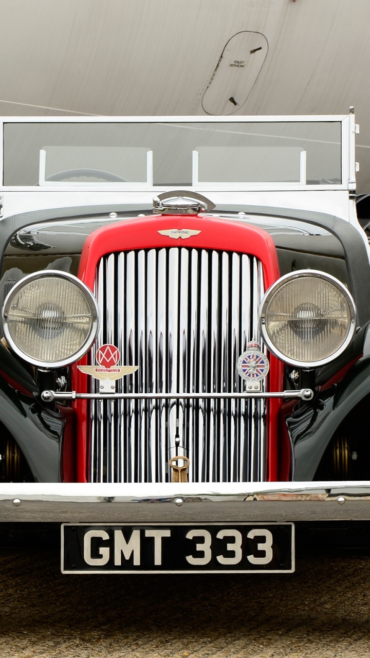 Vintage White Car in a Garage. Wallpaper in 720x1280 Resolution