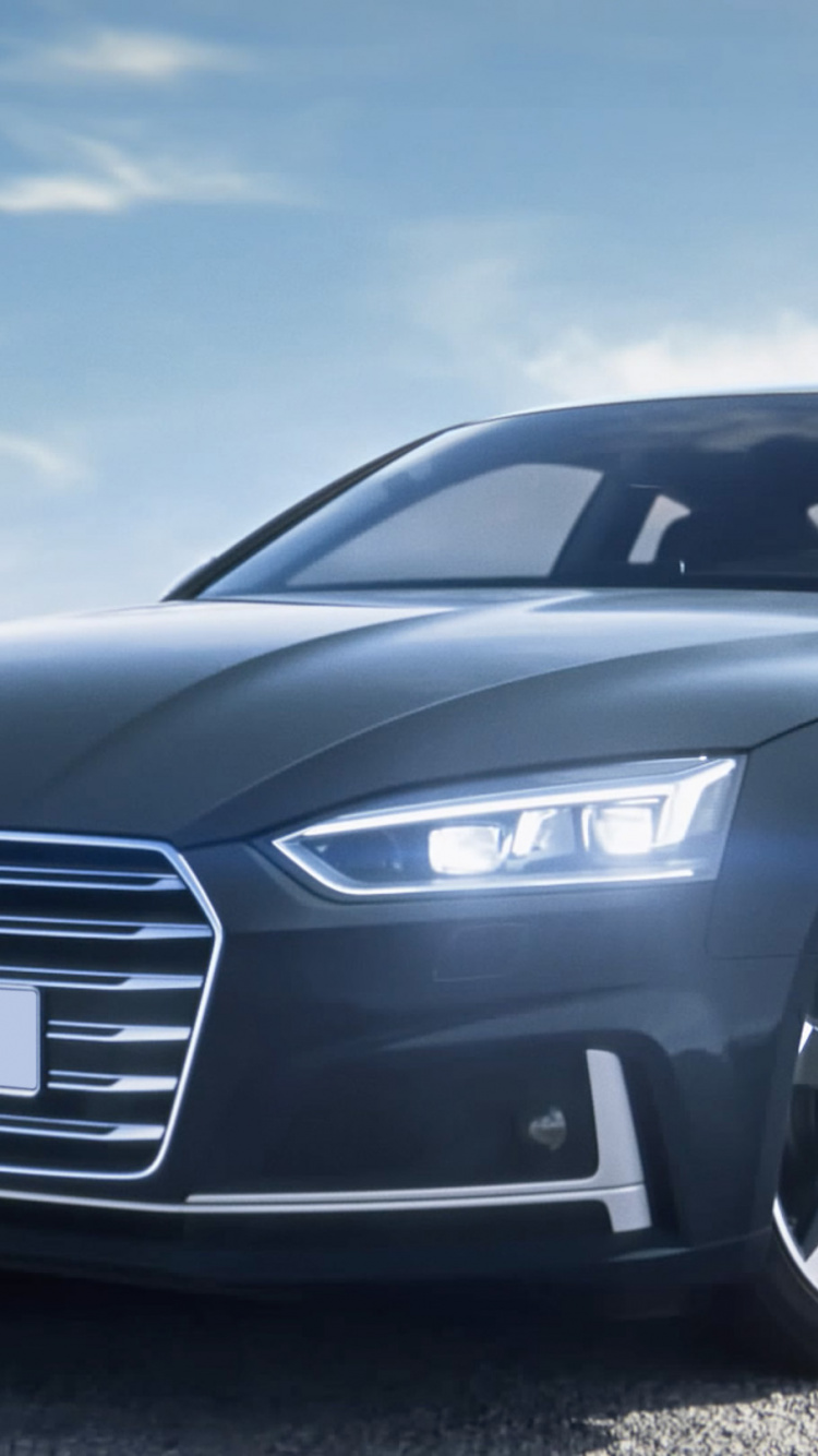 Schwarzes Audi Coupe Tagsüber Unterwegs. Wallpaper in 750x1334 Resolution