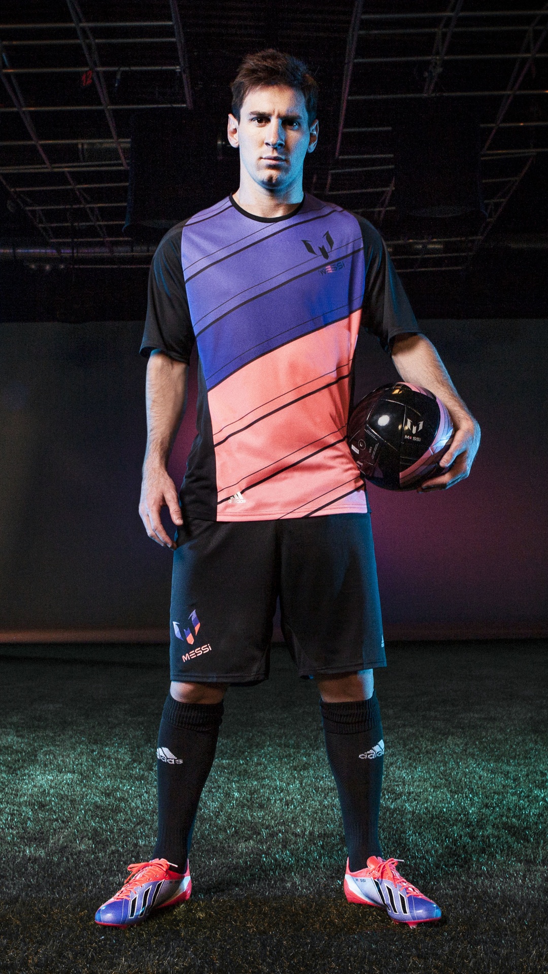 Man in Blue and Black Crew Neck T-shirt and Brown Shorts Holding Black Basketball. Wallpaper in 1080x1920 Resolution