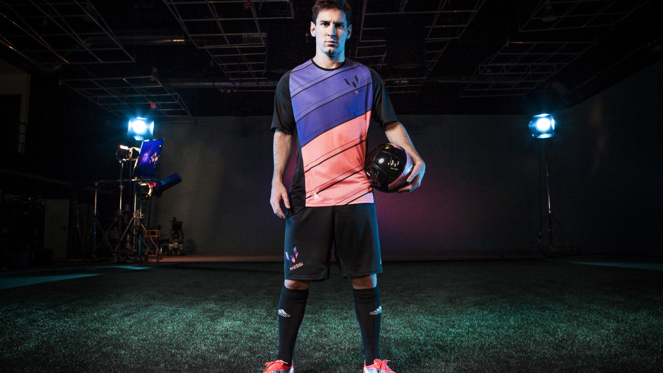 Man in Blue and Black Crew Neck T-shirt and Brown Shorts Holding Black Basketball. Wallpaper in 1366x768 Resolution